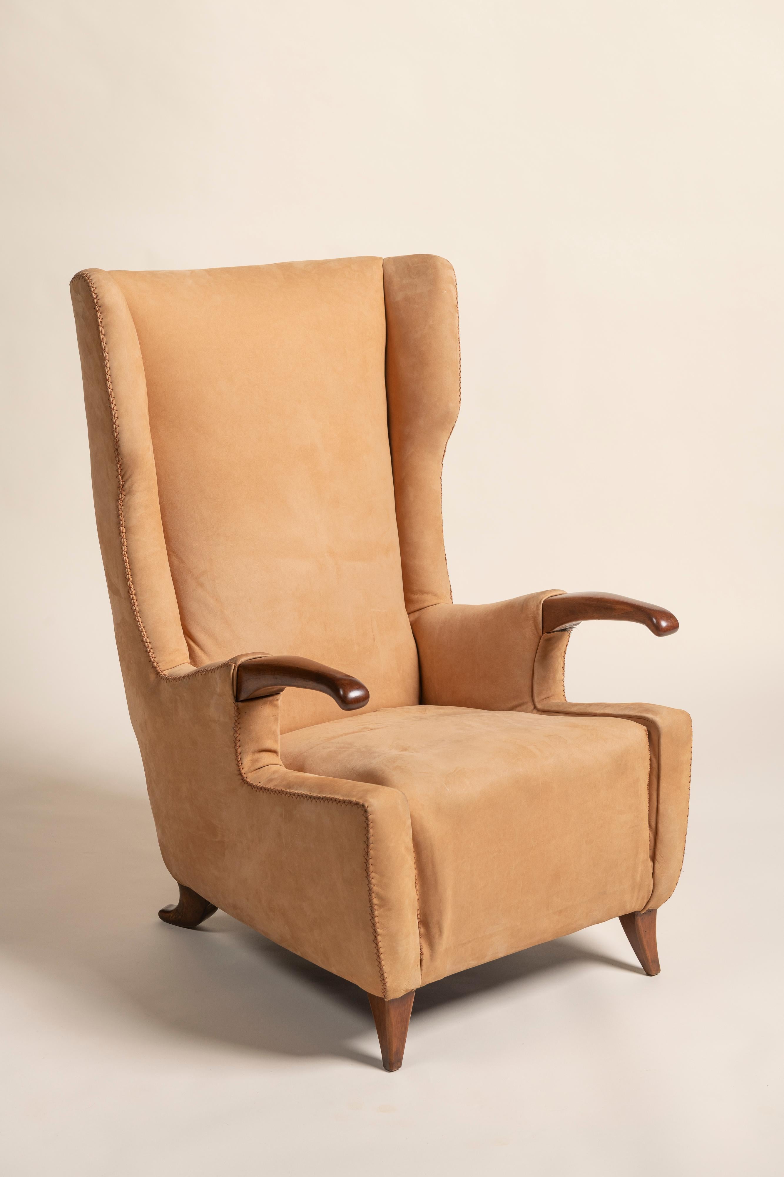 Collectible armchair, model 505 Rol, designed by Italian designer Pier Luigi Colli. The chair features a sculpted frame and is upholstered in soft suede, offering both style and comfort. Its simple, refined design and quality craftsmanship make it a