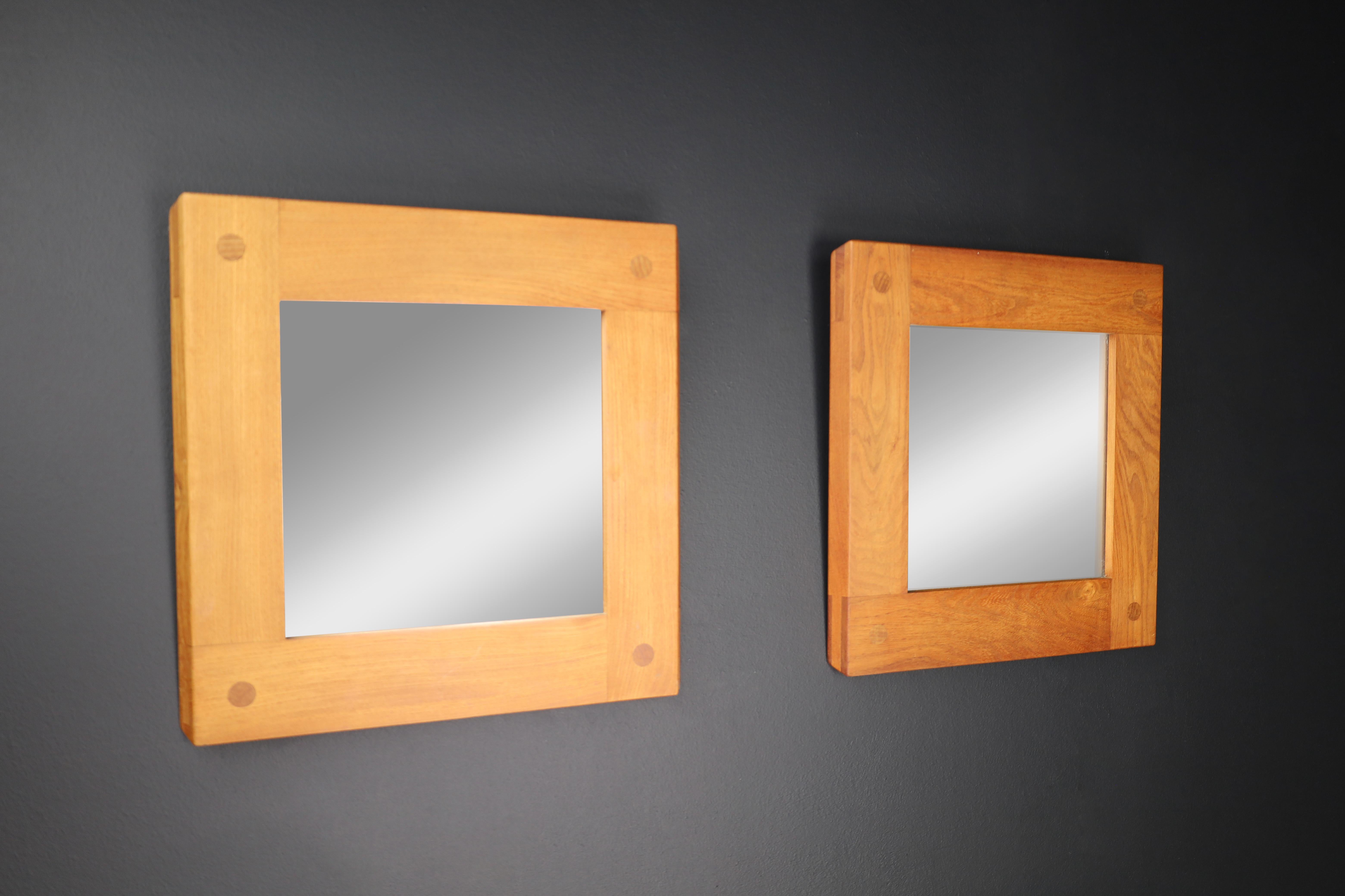 Pierre Chapo Pair of two Mirrors in Elm, France 1970s

This is a pair of two mirrors made by Pierre Chapo in France in the 1970s, crafted from solid elm wood. The mirror boasts of exceptional durability and remarkable visual appeal. The construction