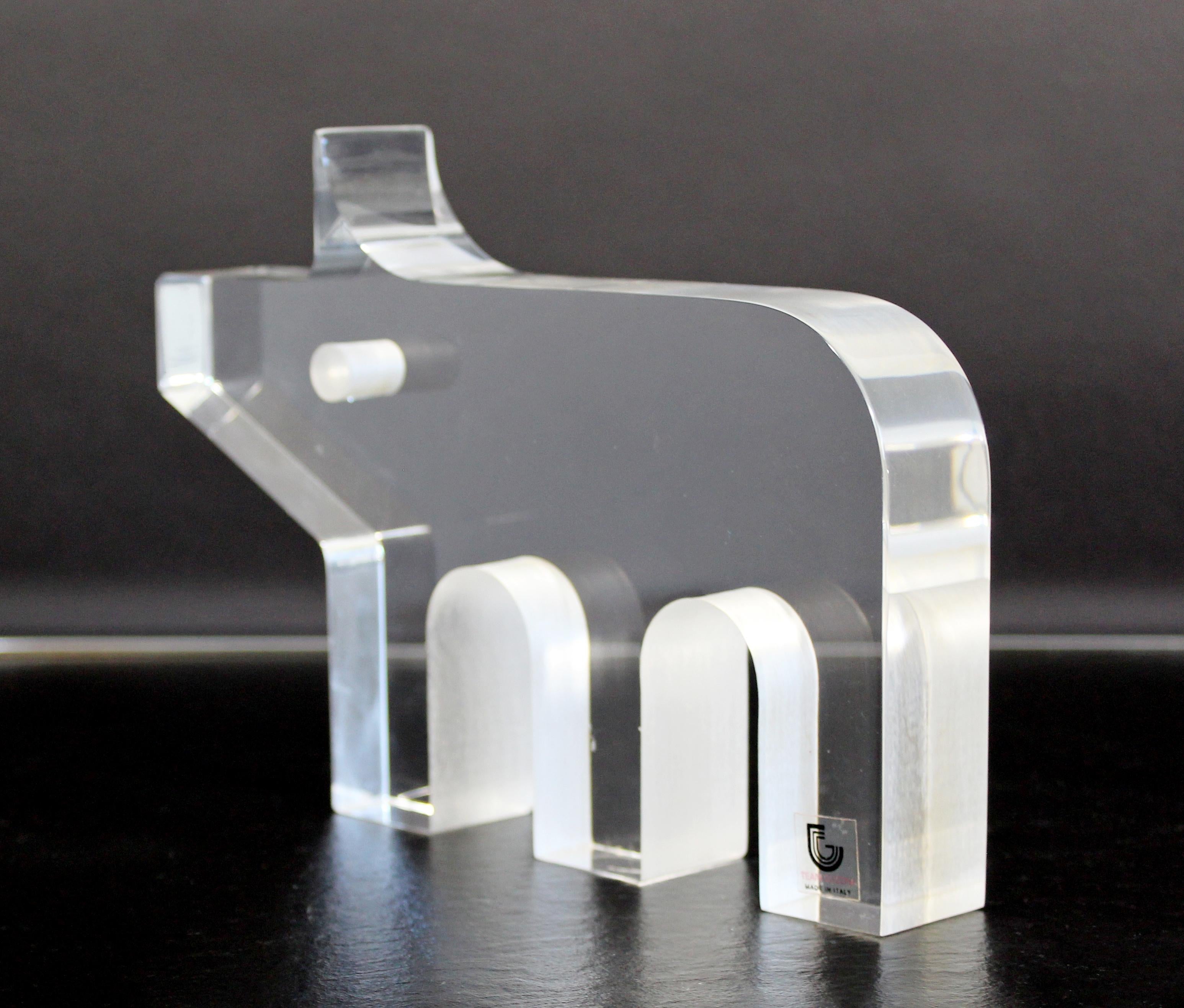 For your consideration is a whimsical, pig table sculpture, made of clear Lucite, by Silvio Russo for Guzzini, circa 1970s. In excellent vintage condition. The dimensions are 8