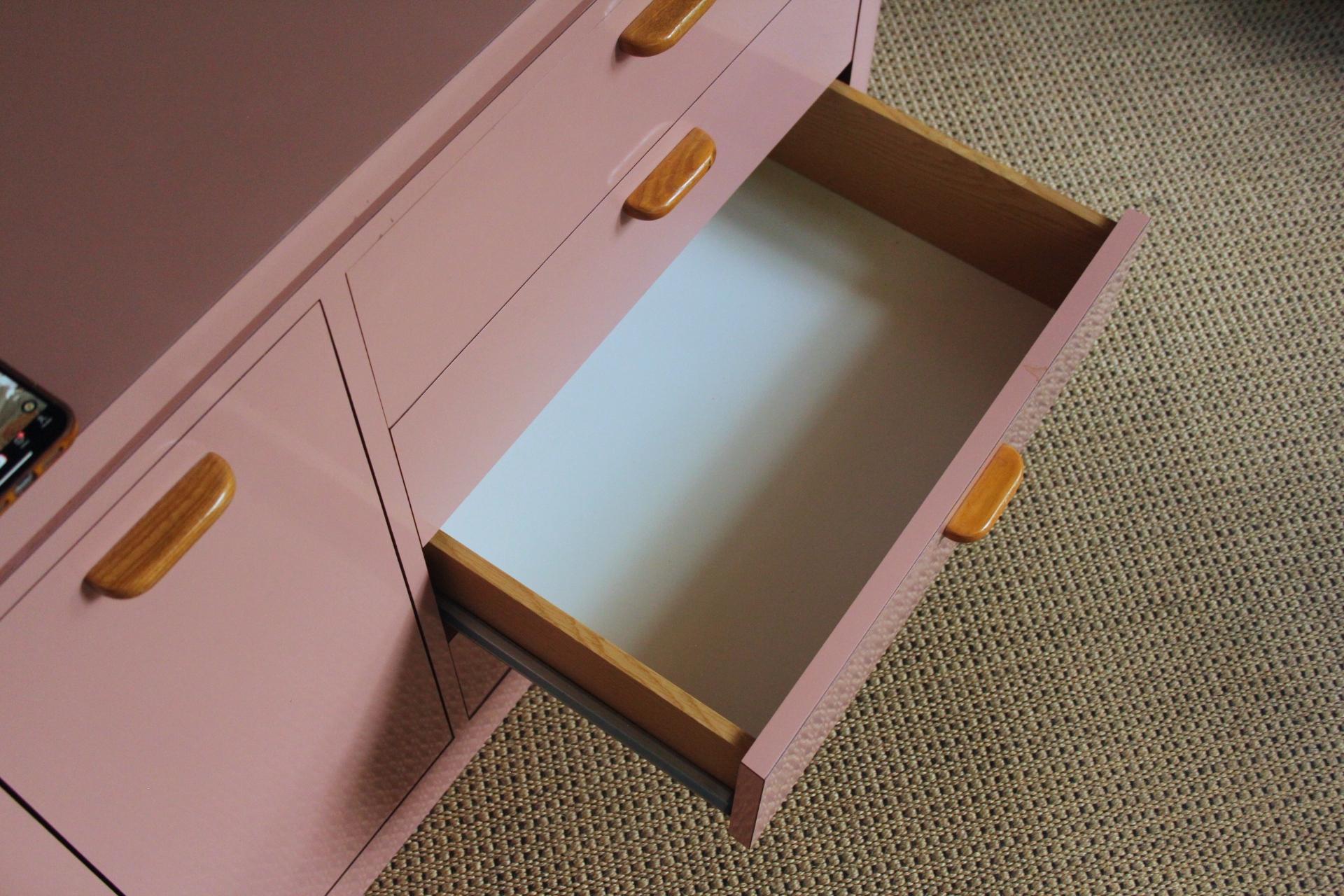 Laminated Mid-Century Modern  Pink Laminate Shallow Desk with 4 Drawers and Teak Handles