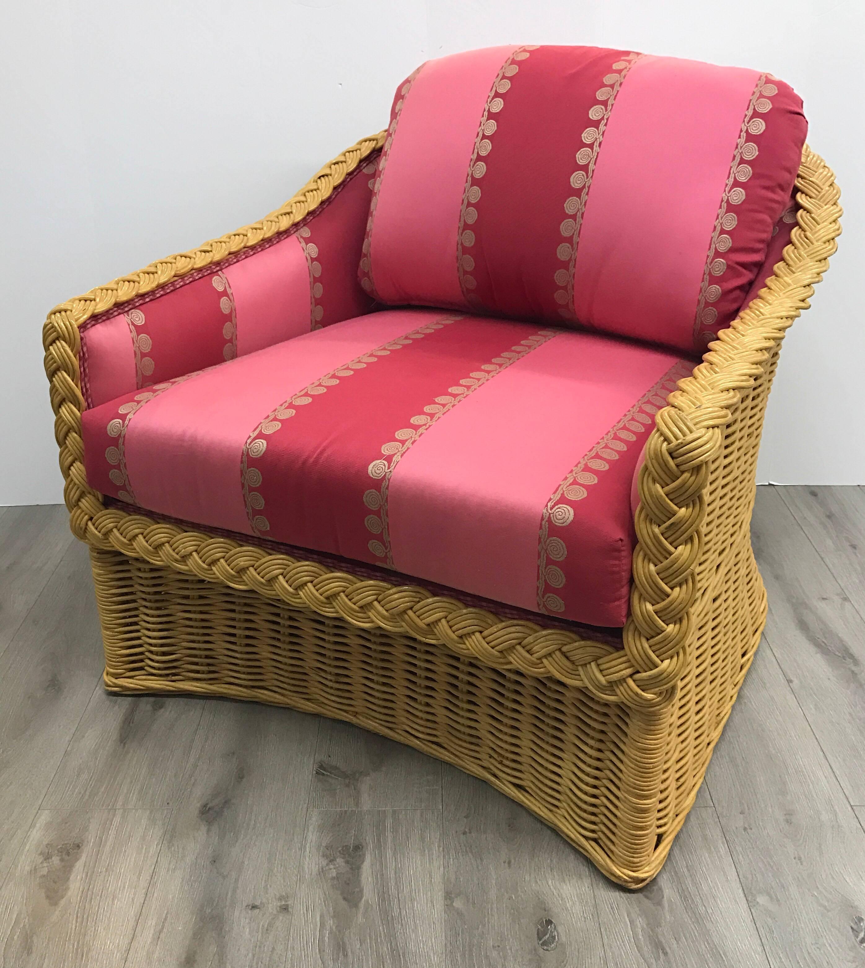 The colors are killer on this wicker lounge chair with matching ottoman. Chairs is upholstered inside and also has a loose seat and back cushion. Ottoman has a loose cushion.
Ottomans measure 27 x 30 x 19 inches tall.
