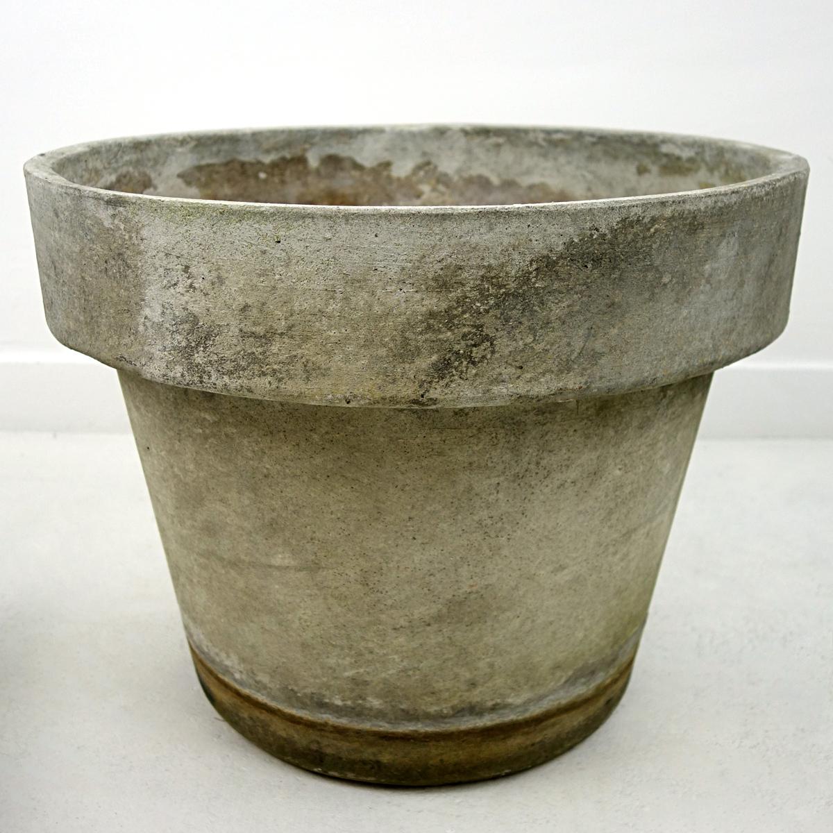 Beautiful planter in the shape of the classical flower pot designed by famous Swiss artist, designer and architect Willy Guhl. 
With its beautiful patina it will make for a pretty picture on your rooftop or patio.