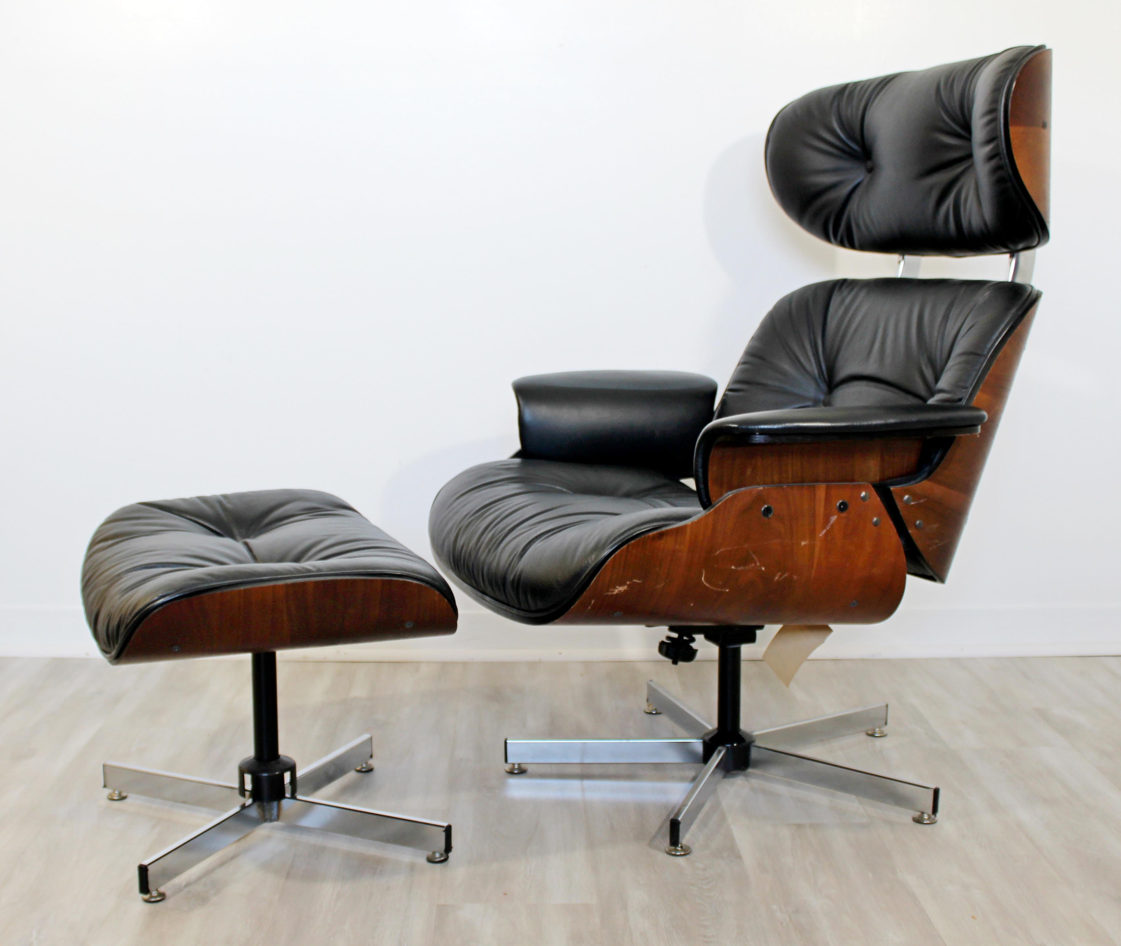 For your consideration is a beautiful lounge armchair and ottoman, with black leather upholstery, by Plycraft, circa the 1960s, in the style of Eames for Herman Miller. In good vintage condition. The dimensions of the chair are 32