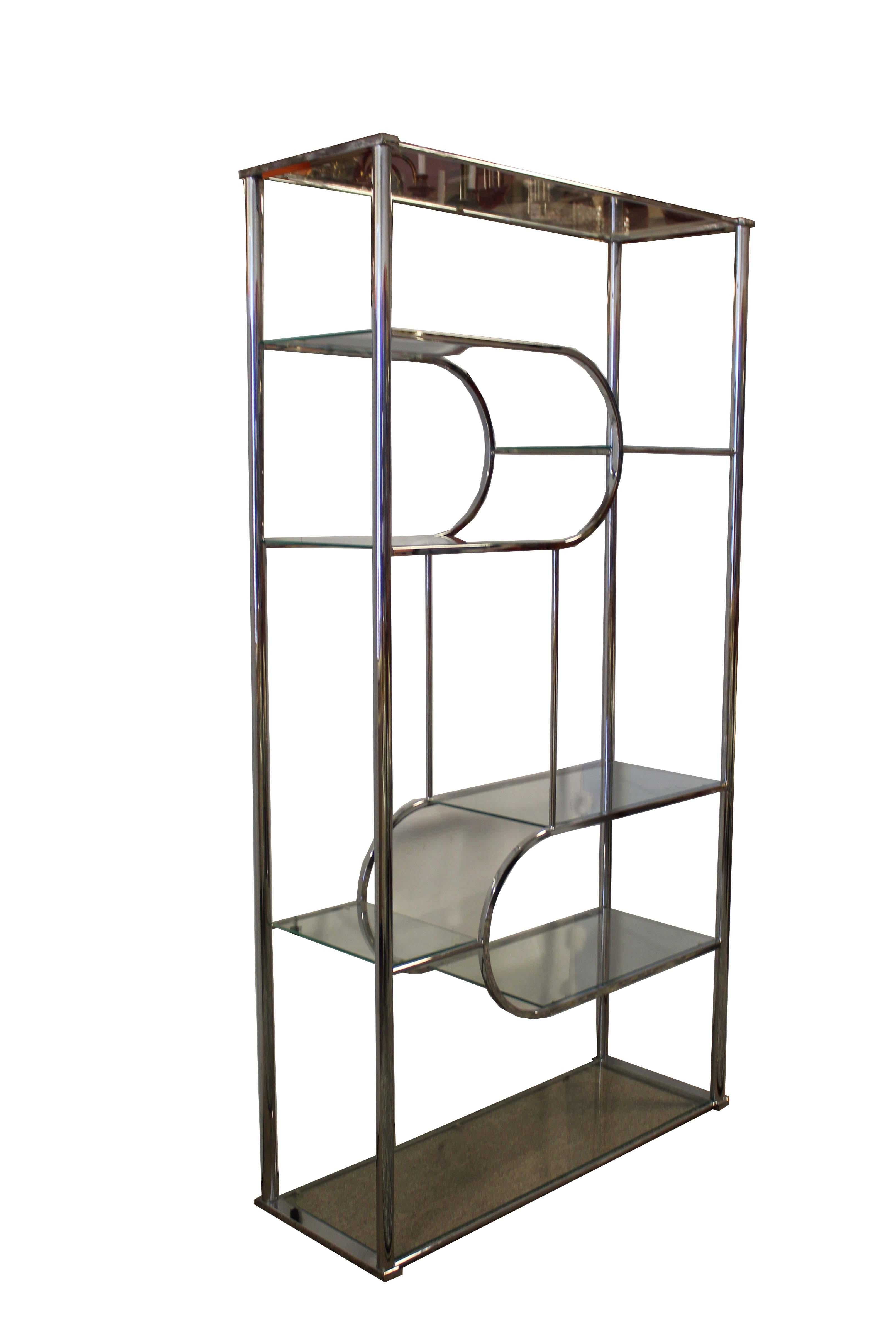 This beautiful polished chrome sculptiral etagere shelving display unit. In great condition. Dimensions: 41.5