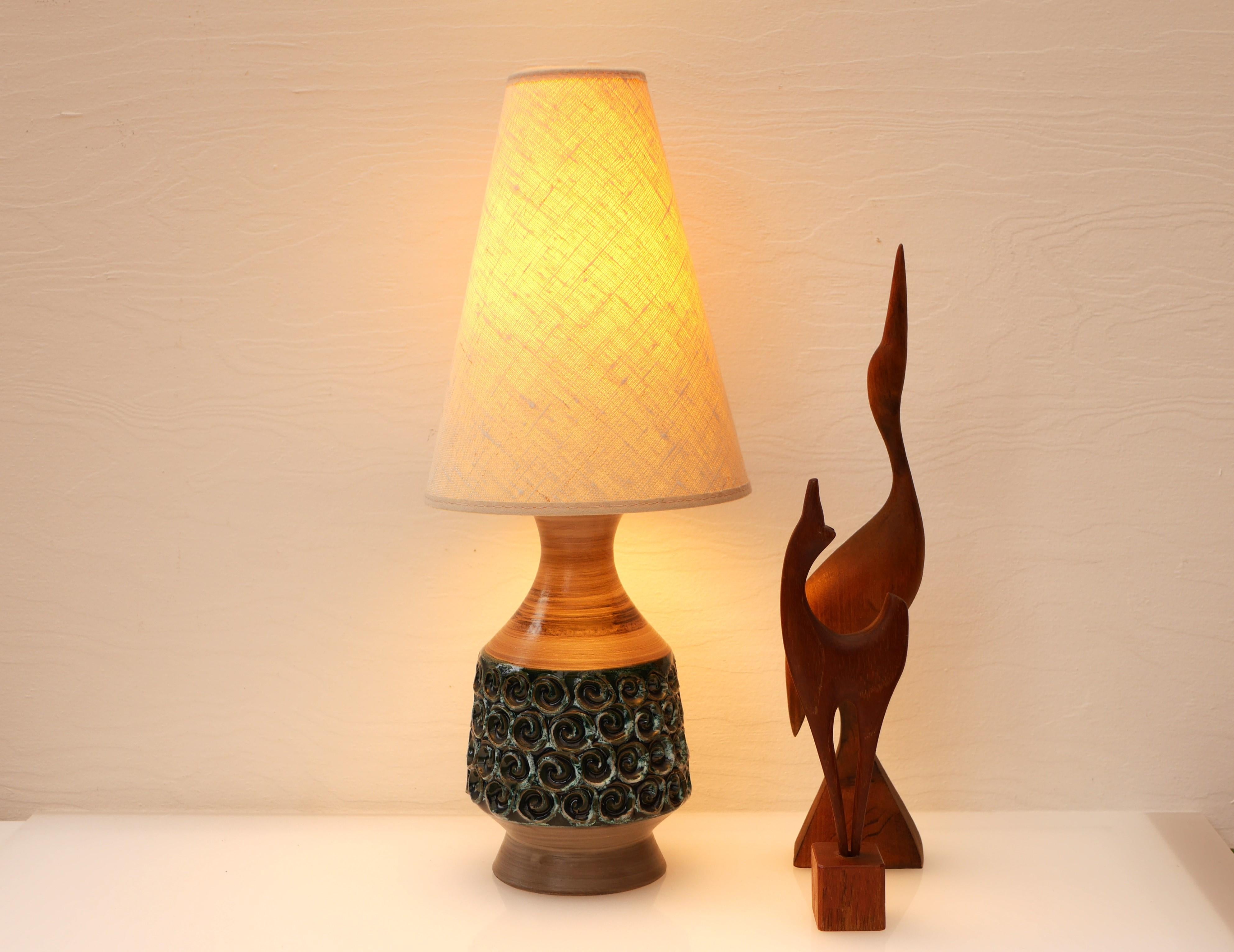 A beautiful handmade ceramic lamp base from Bitossi, Italy. This is very adorable little lamp which has very muted colours, with a warm pale brown base with green details in the middle section, which gives it a contemporary feeling. It is 24cm