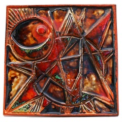 Used Mid-century modern pottery wall plaque with an abstract pattern, from Tilgmans