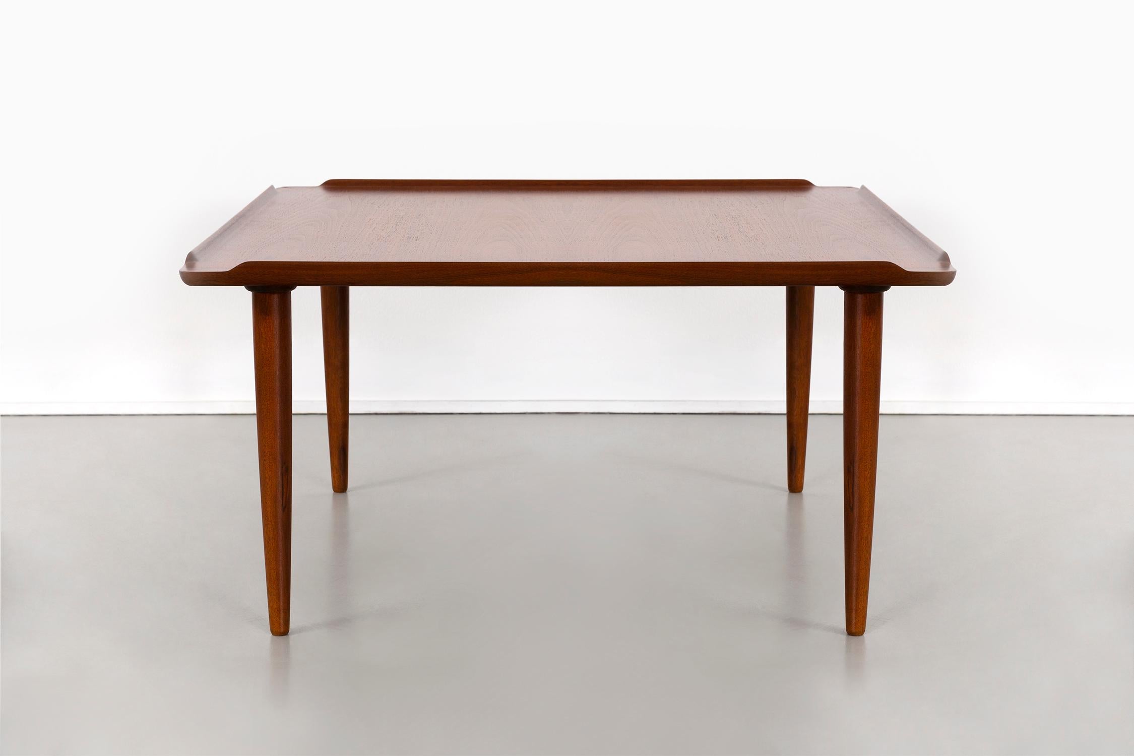 Coffee table

Designed by Poul Jensen for Selig

Denmark, circa 1960s.

Teak

Measures: 16 ½” H x 31 15/16” W x 31 15/16” D.

Freshly refinished in excellent condition.