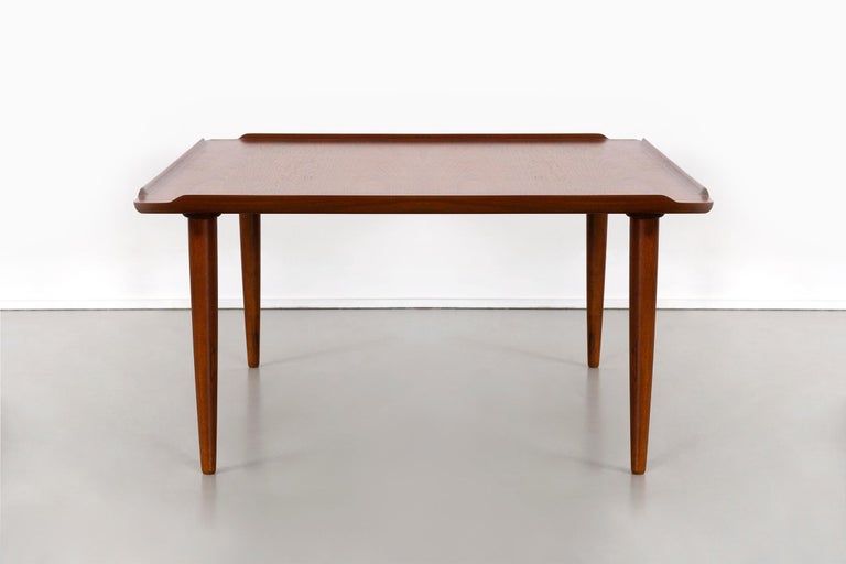 Selig Coffee Table - Danish Modern Teak and Aluminium Coffee Table by Selig For ... / Tapered pin style legs elevate a richly grained table top with flared ends.