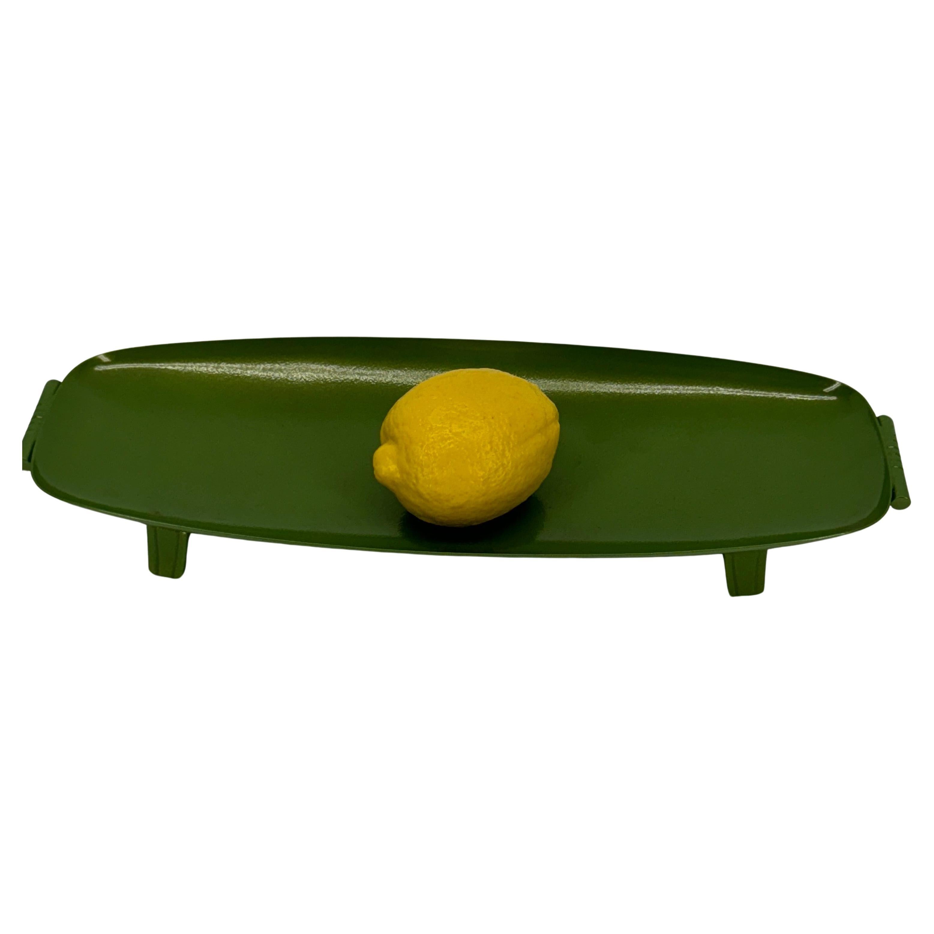 MCM Green Painted Metal Vide-Poche or Dish

A versatile newly powder coated vintage metal tray in a fantastic shade of green. This particular green color has been sought after in the decorating world as of late and could be used on a side or entry