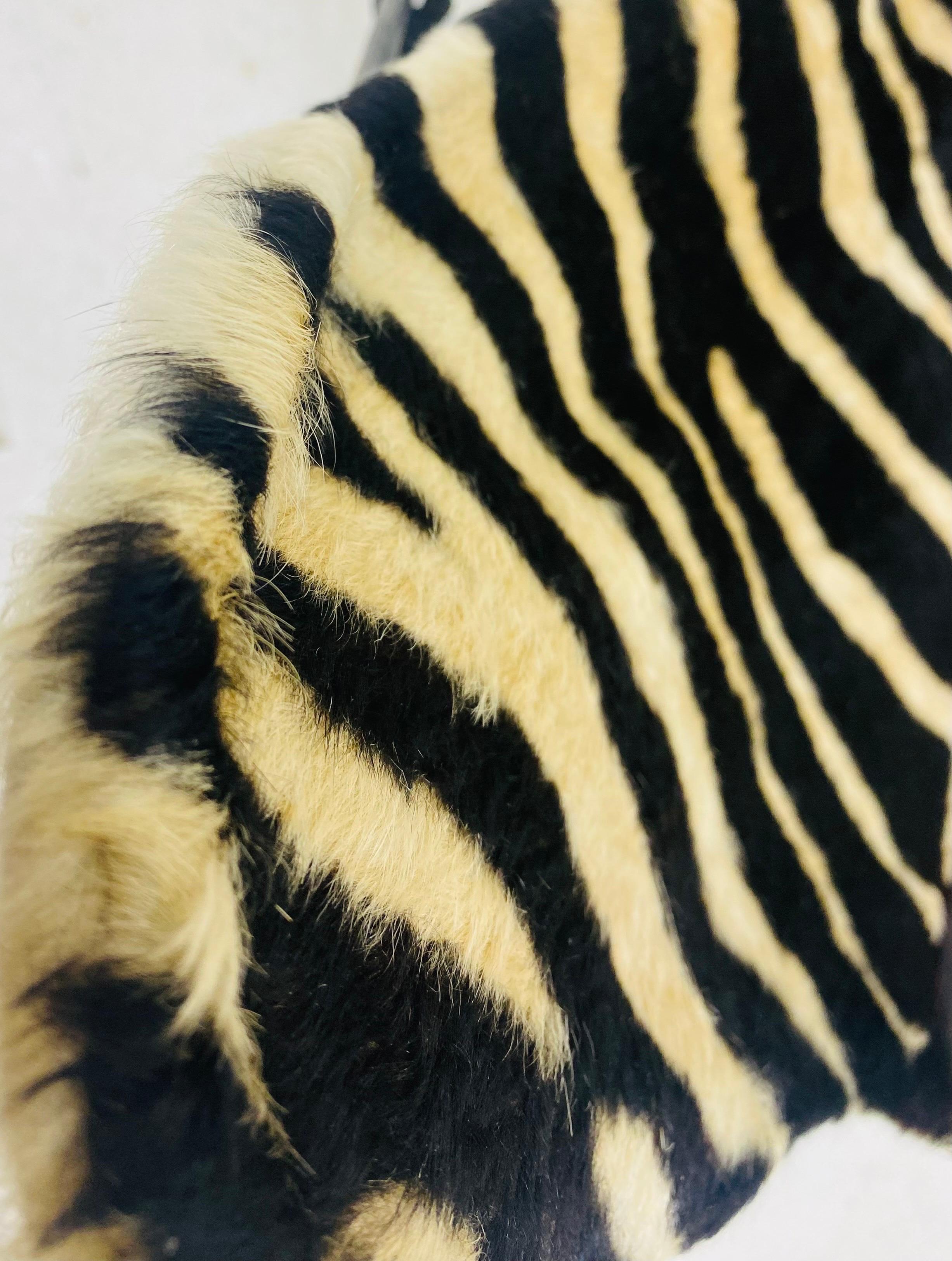 American Mid century, modern printed cowhide folding safari chair
