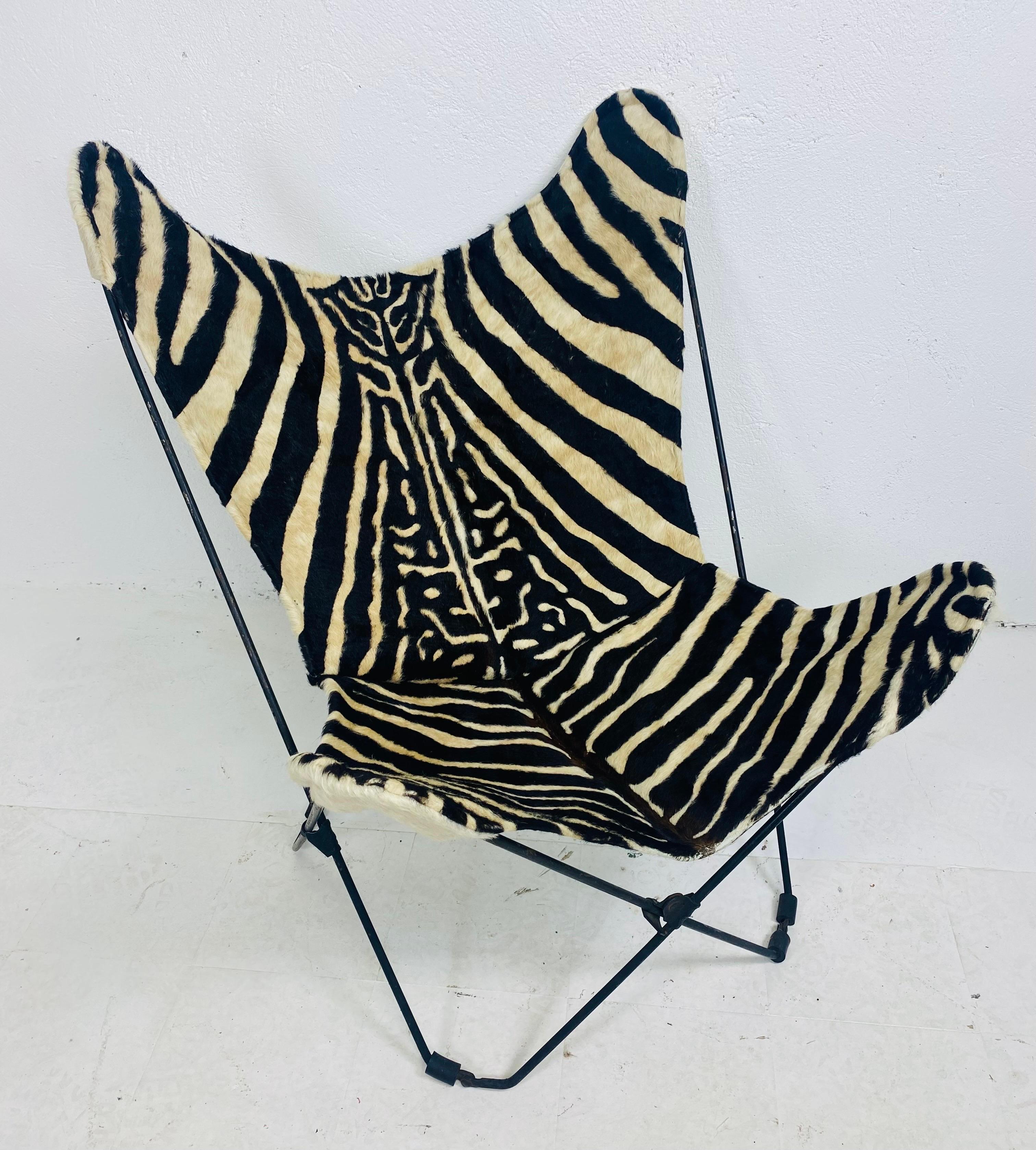 Metalwork Mid century, modern printed cowhide folding safari chair For Sale