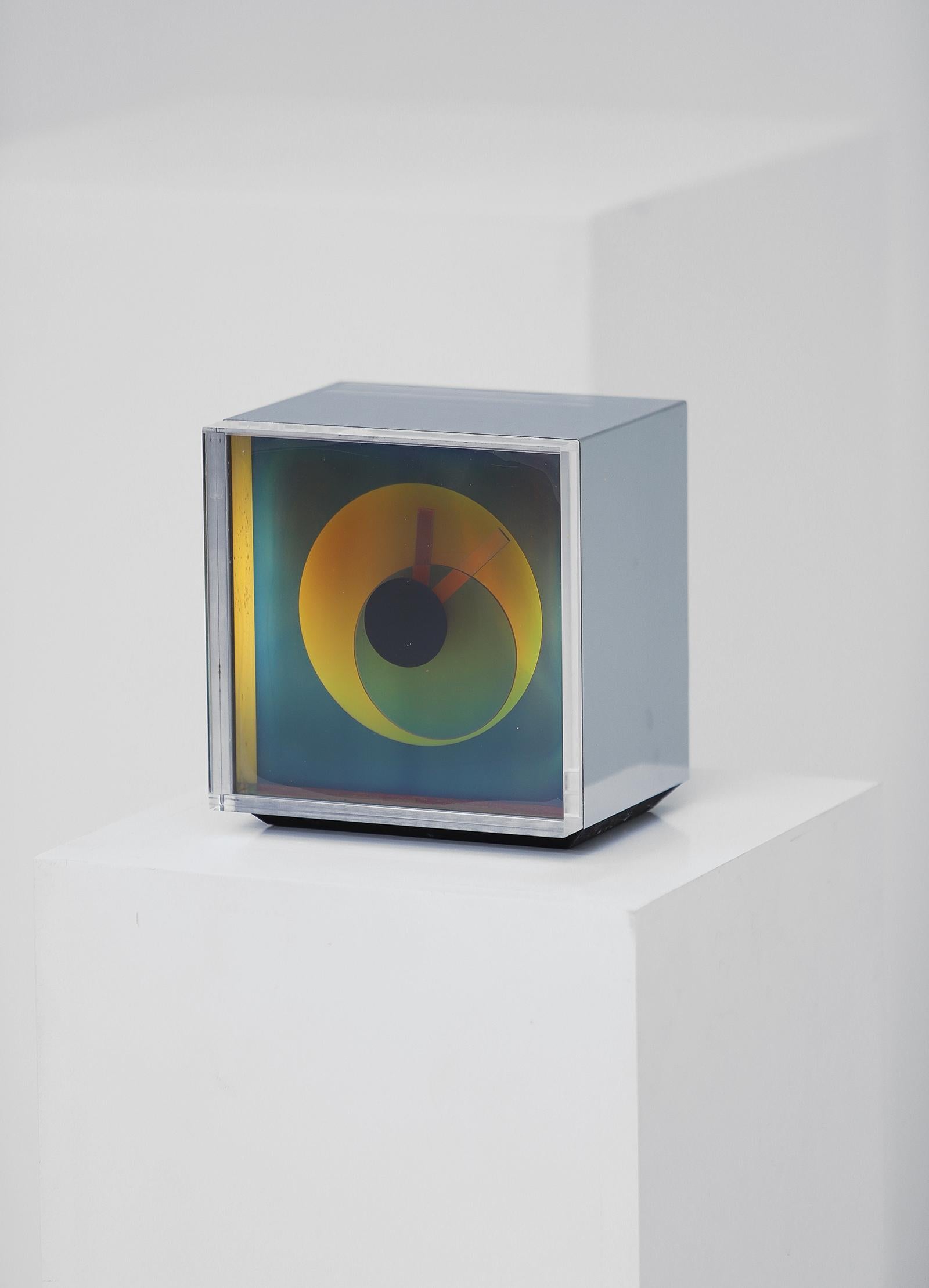 A vintage 1970s Aurora clock with original box. These stunning clocks are in the collection of the Museum of Modern Art MOMA in NY. Developed in the 1970s by a NASA engineer and an architect these stunners were first produced by Rathcon and later