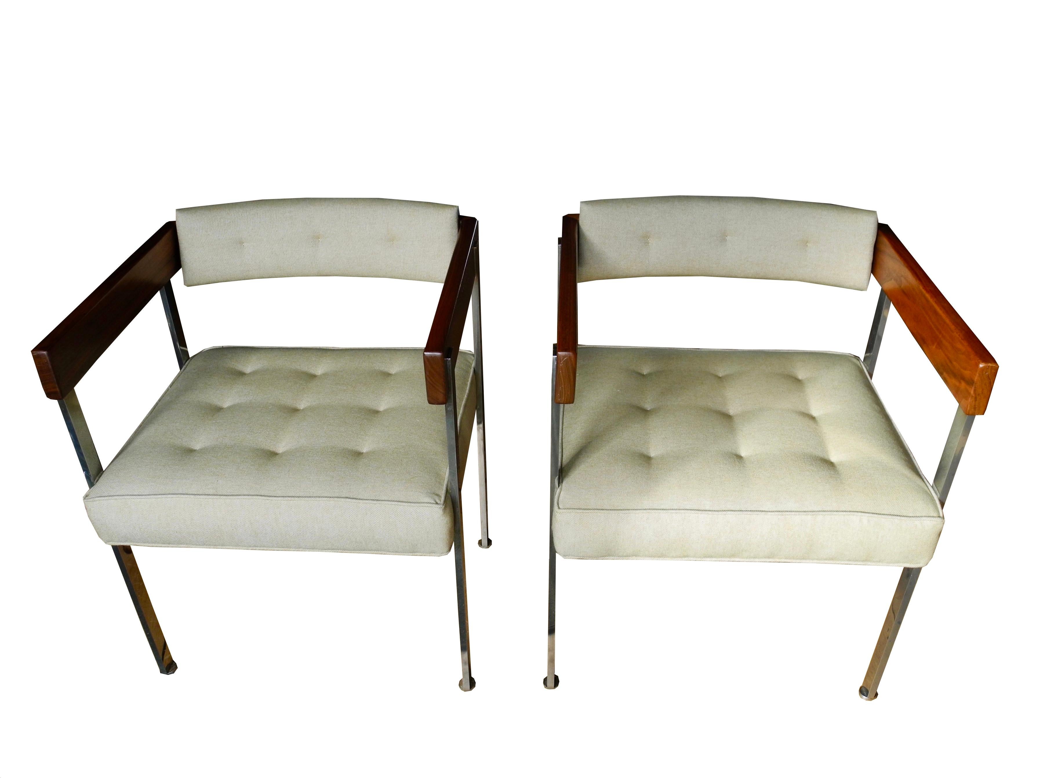 This handsome pair are chairs by Harvey Probber are uniquely made of three materials, solid stainless steel, walnut and upholstery. Probber called them pull-up chairs, designed in 1963. Two more are available upon request.