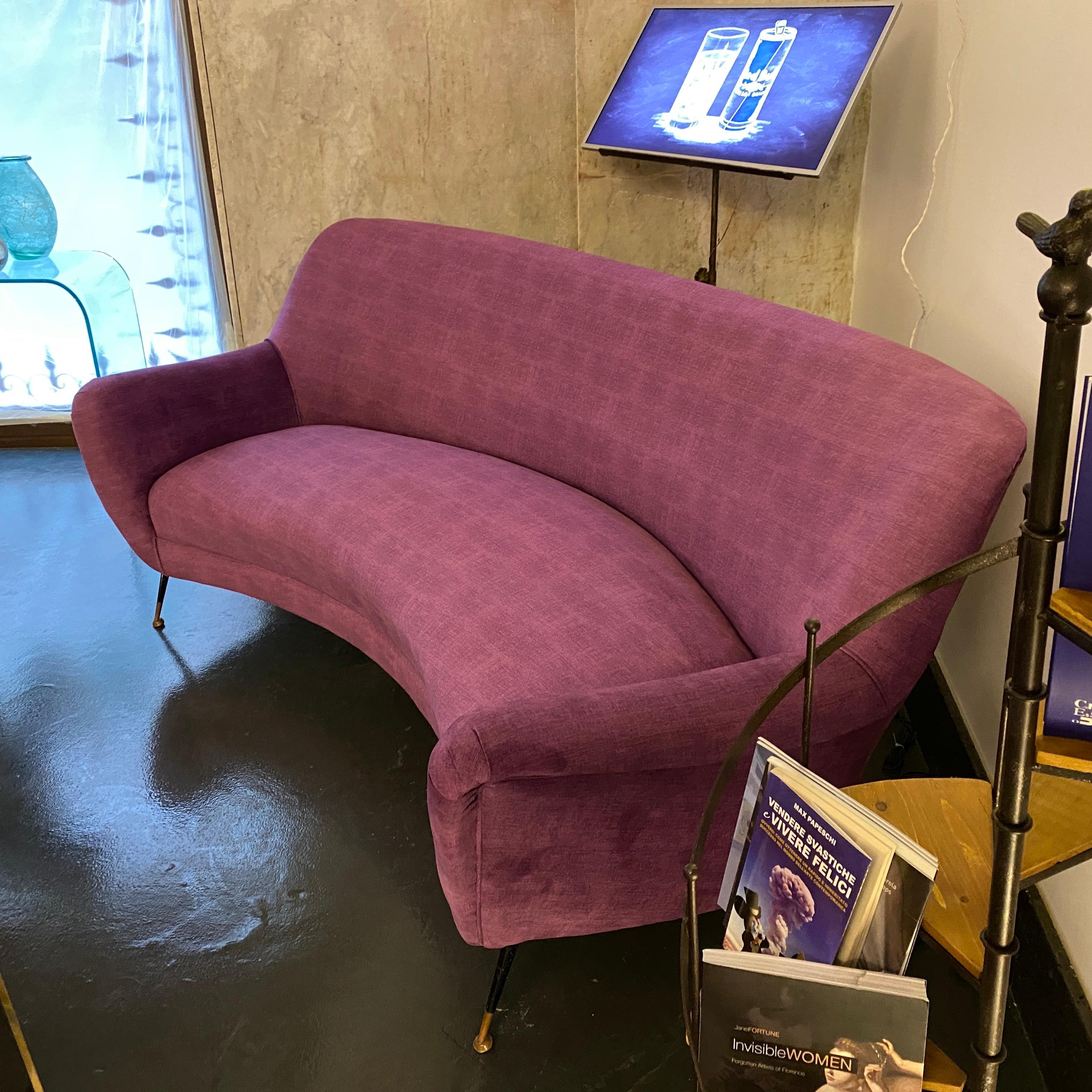 purple curved sofa