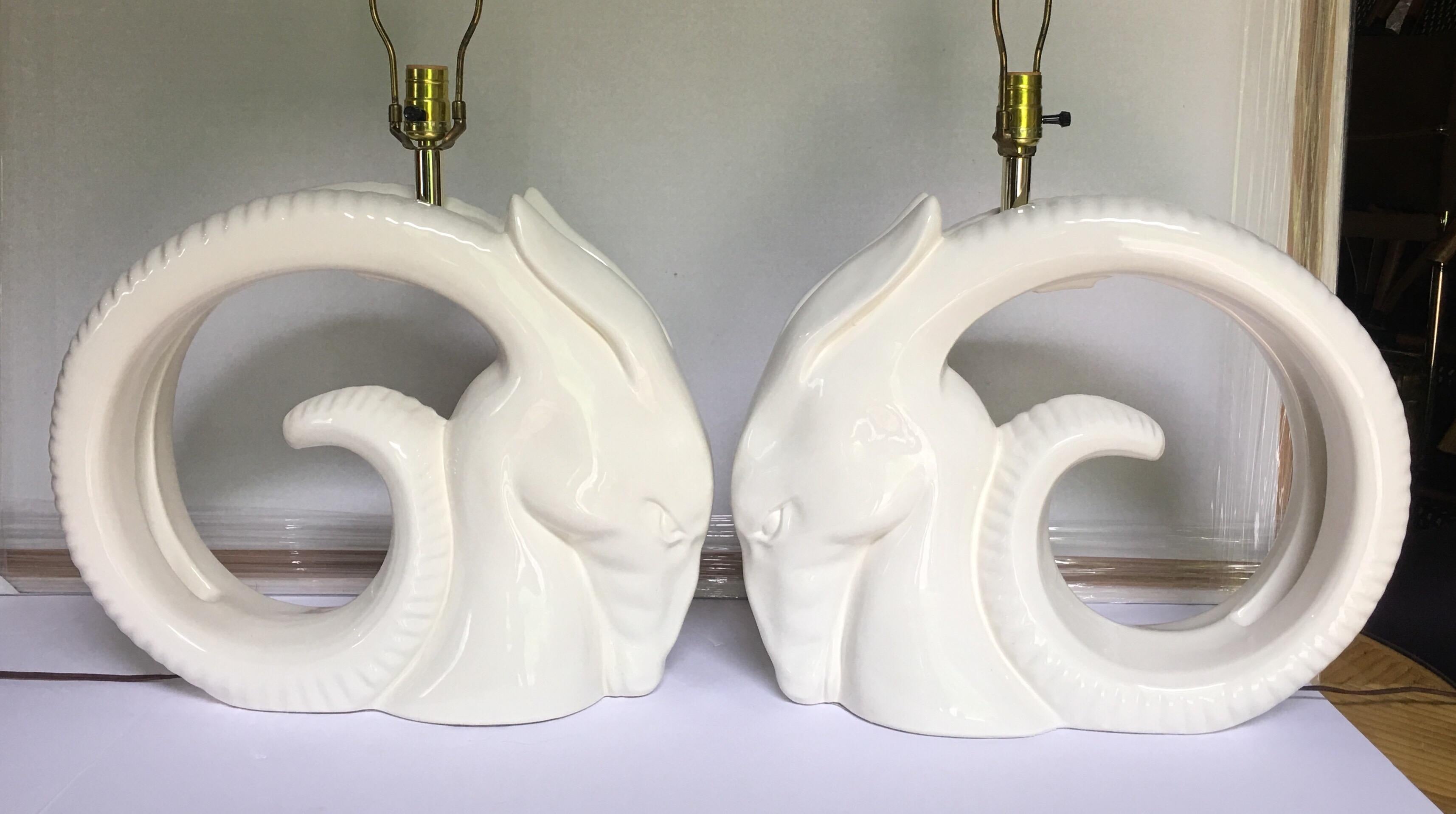 Large Mid-Century Modern animal head bust table lamps. Sculptural form ceramic glazed ram, gazelle or antelope with large curved horns. Lamp Shades not included. 

Price is per lamp. 

Measures: Height 31.5 inches to finial. 19.5 inches to socket.