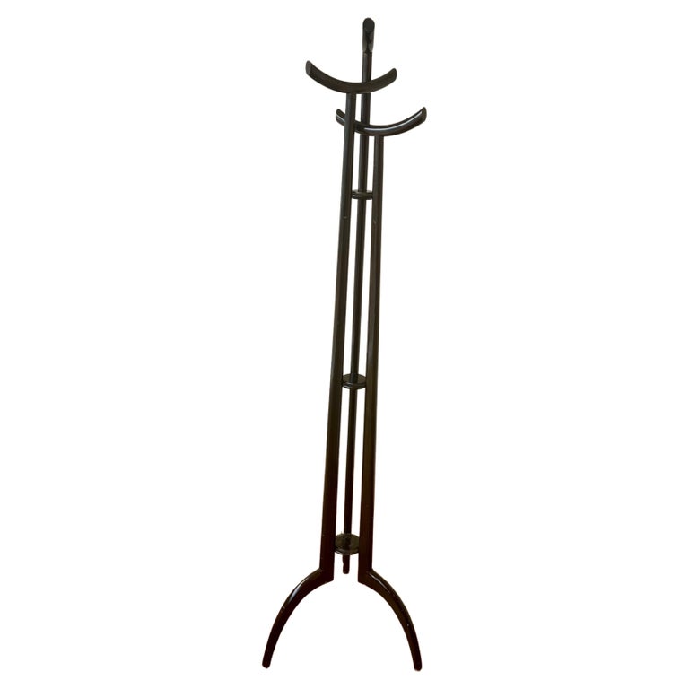 Rare and beautiful design on this solid mahogany with walnut finish coat hat rack stand, all original finish, circa the 1950s. brought from Italy.