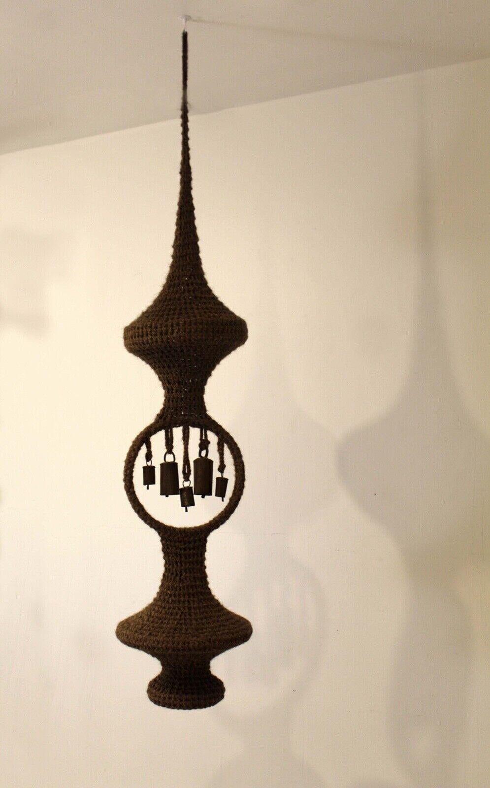 Le Shoppe Too is proud to present this super rare Jane Knight Fiber art piece with metal bell chimes. In the style of Ruth Asawa. Comes from the original owner with original paperwork and exhibition card. In very good condition. Dimensions: 12