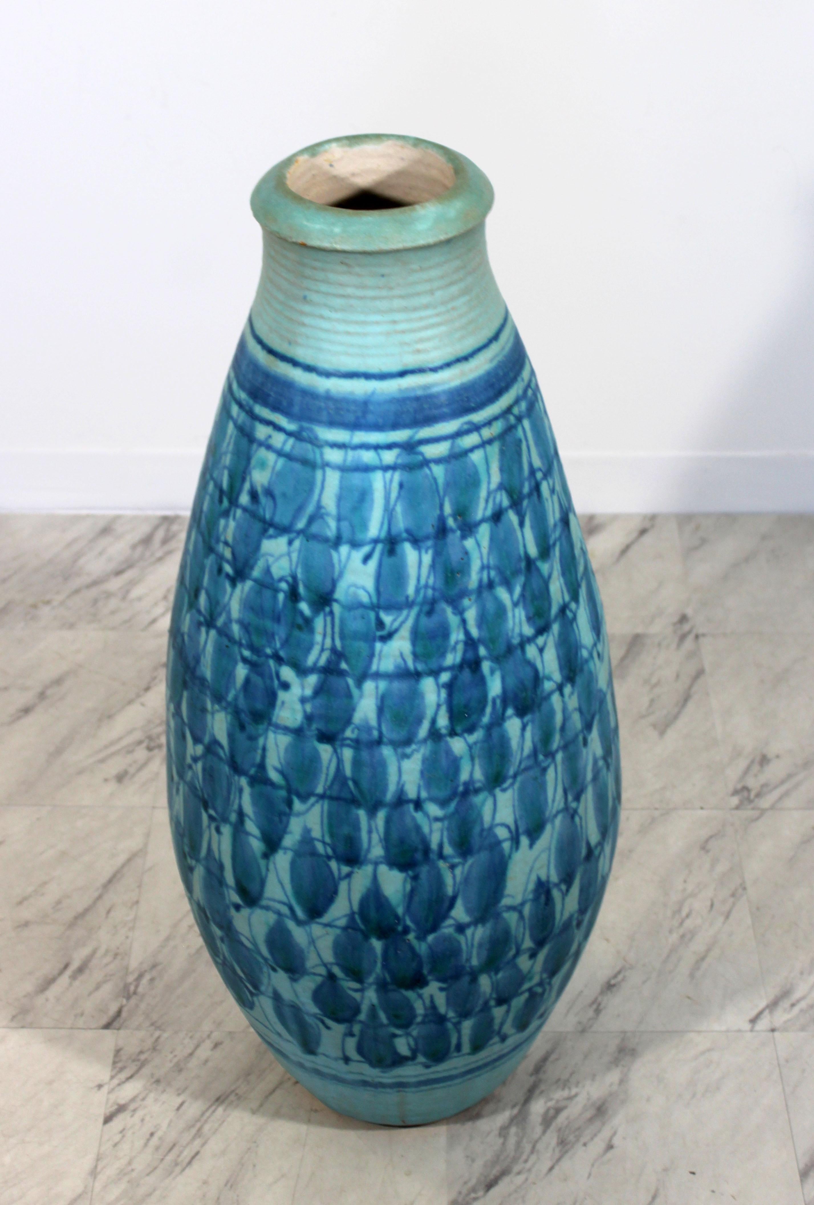 For your consideration is an rare exquisite, blue glazed ceramic vase, signed by J.T. Abernathy, circa the 1960s. Cranbrook Studio artist. In excellent condition. The dimensions are 9