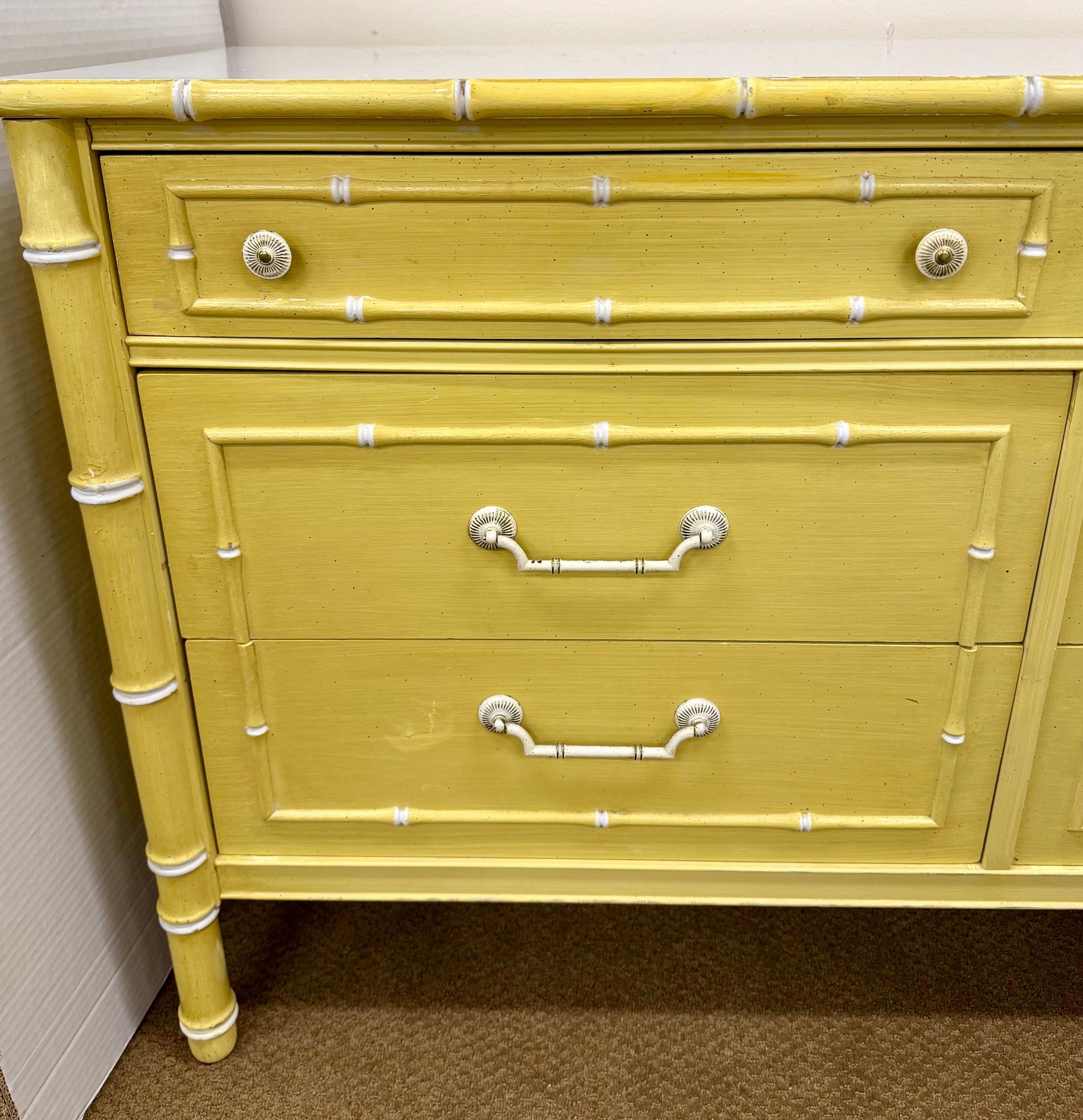 Rare and highly sought-after Thomasville Allegro dresser from 1963 is a stunning example of mid-century modern design with Chinoiserie influences. Featuring faux bamboo details and a vibrant yellow finish, this six-drawer dresser is both functional