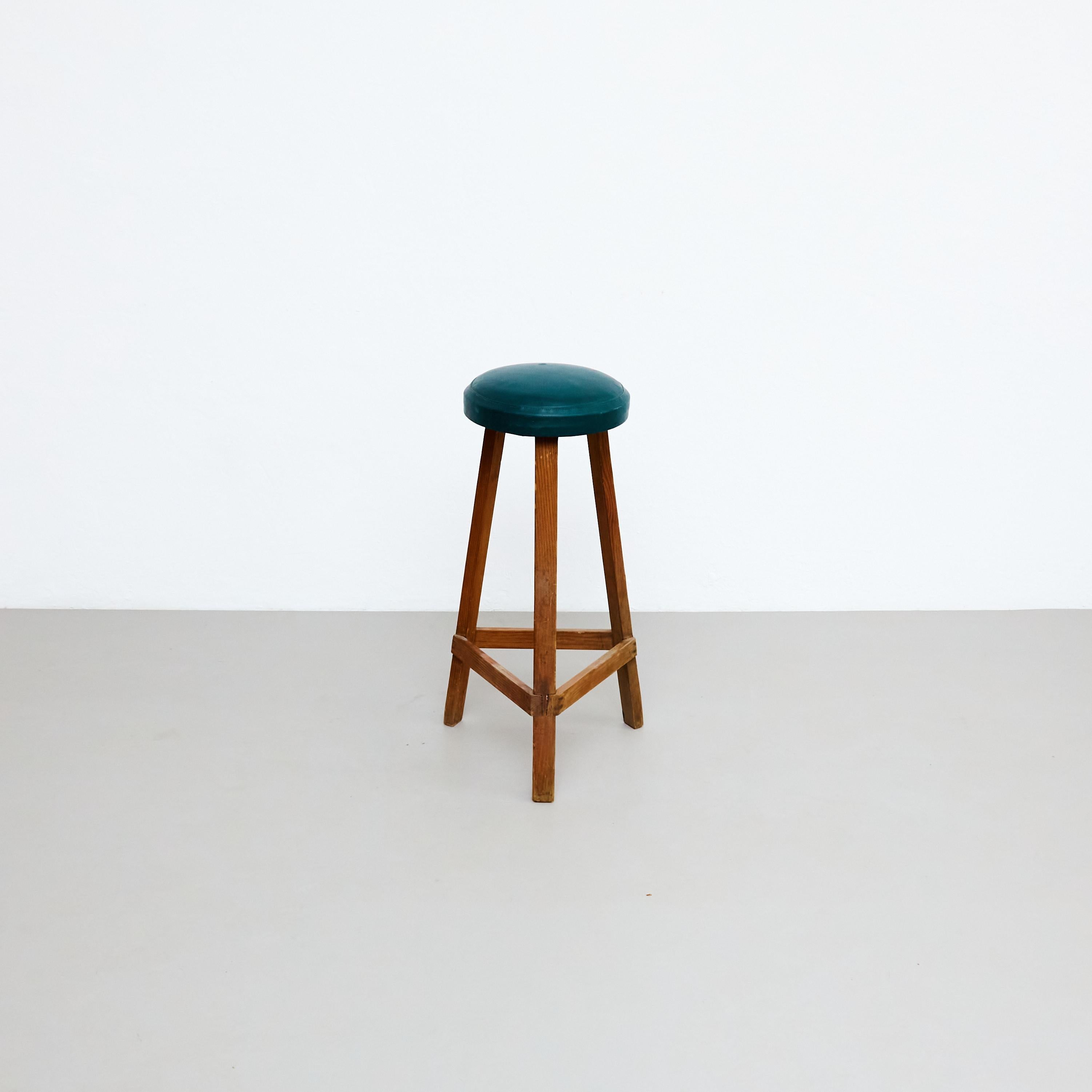 Mid-Century Modern Rationalist wood high stool, by unknown designer.    Manufactured in France, circa 1950.    In original condition with minor wear consistent of age and use, preserving a beautiful patina.    Materials:   Wood     Dimensions:   D