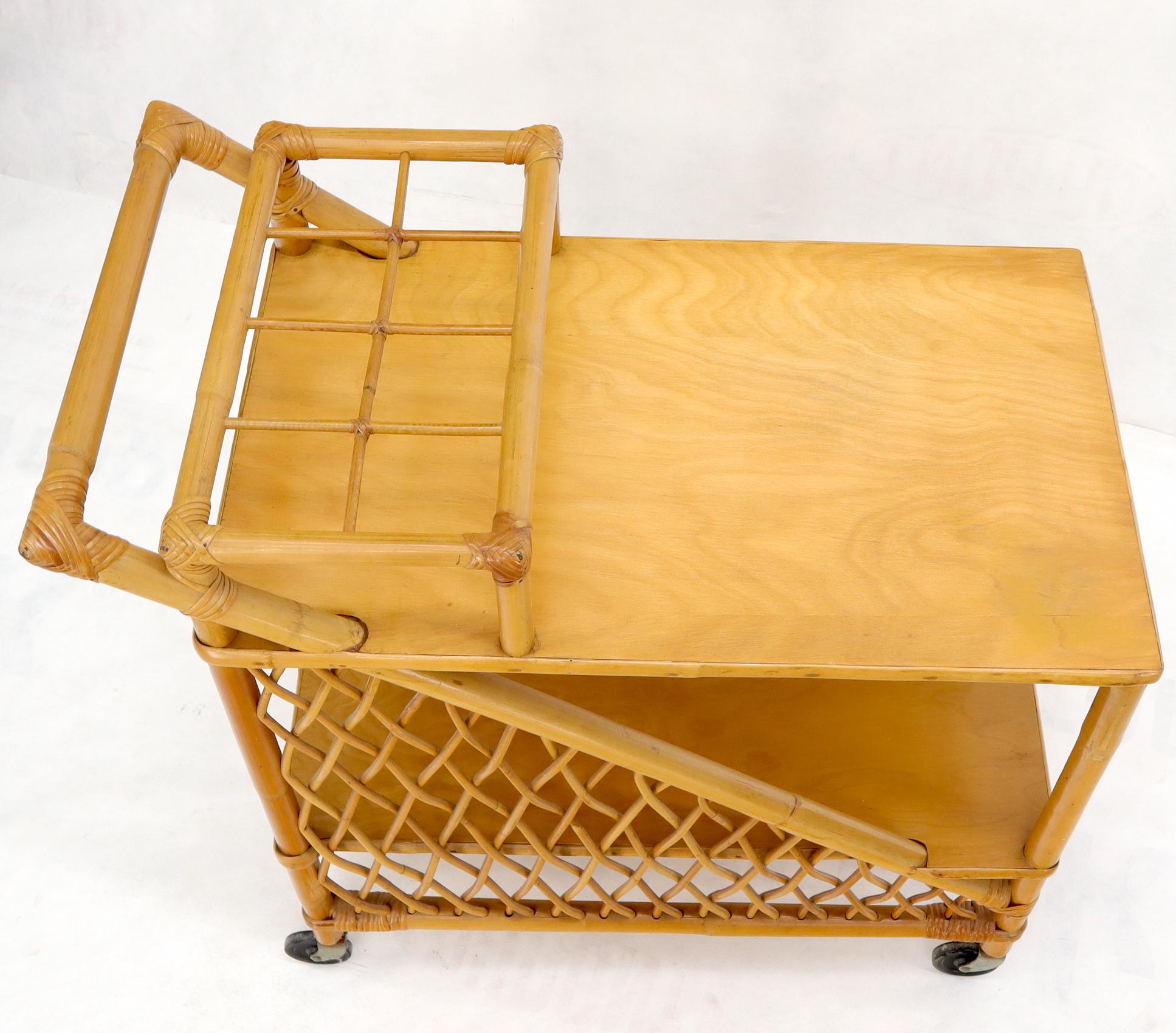 Mid-Century Modern Mid century modern rattan and bamboo serving bar cart w/ bottles holder. For Sale