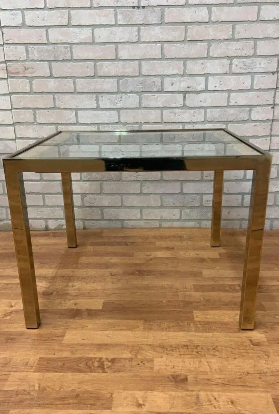 Mid Century Modern Rattan and Gold Brass Glass Top Side Table

This vintage mid century modern side table is sure to be the talk of the room! With its rattan and glass inlaid table with gold brass legs it is the perfect piece from the 70s to bring