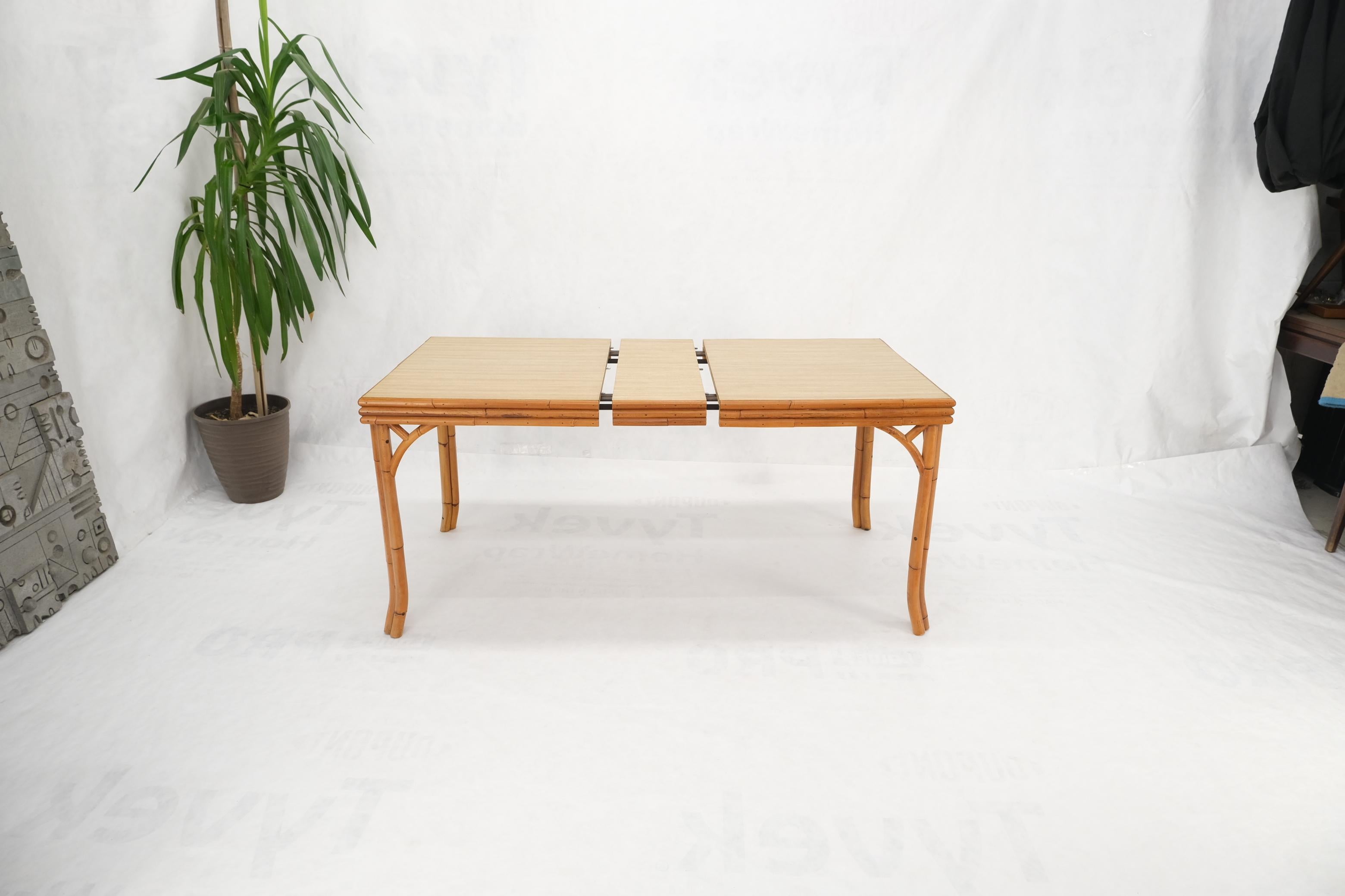 Mid-Century Modern vintage dining table with rattan base formica top.