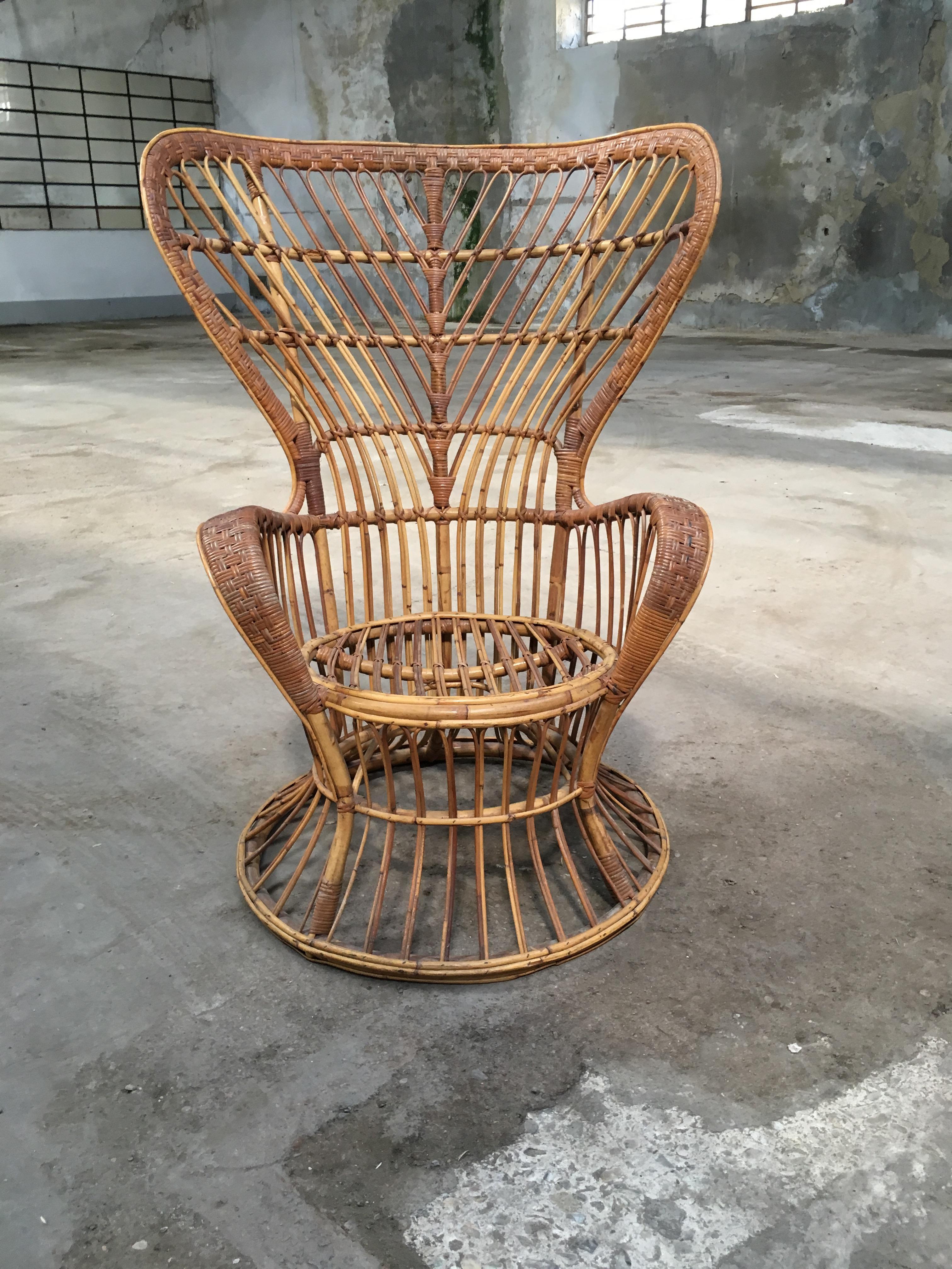 Mid-Century Modern Italian rattan and cane armchair by Lio Carminati for Bonacina, 1940s.