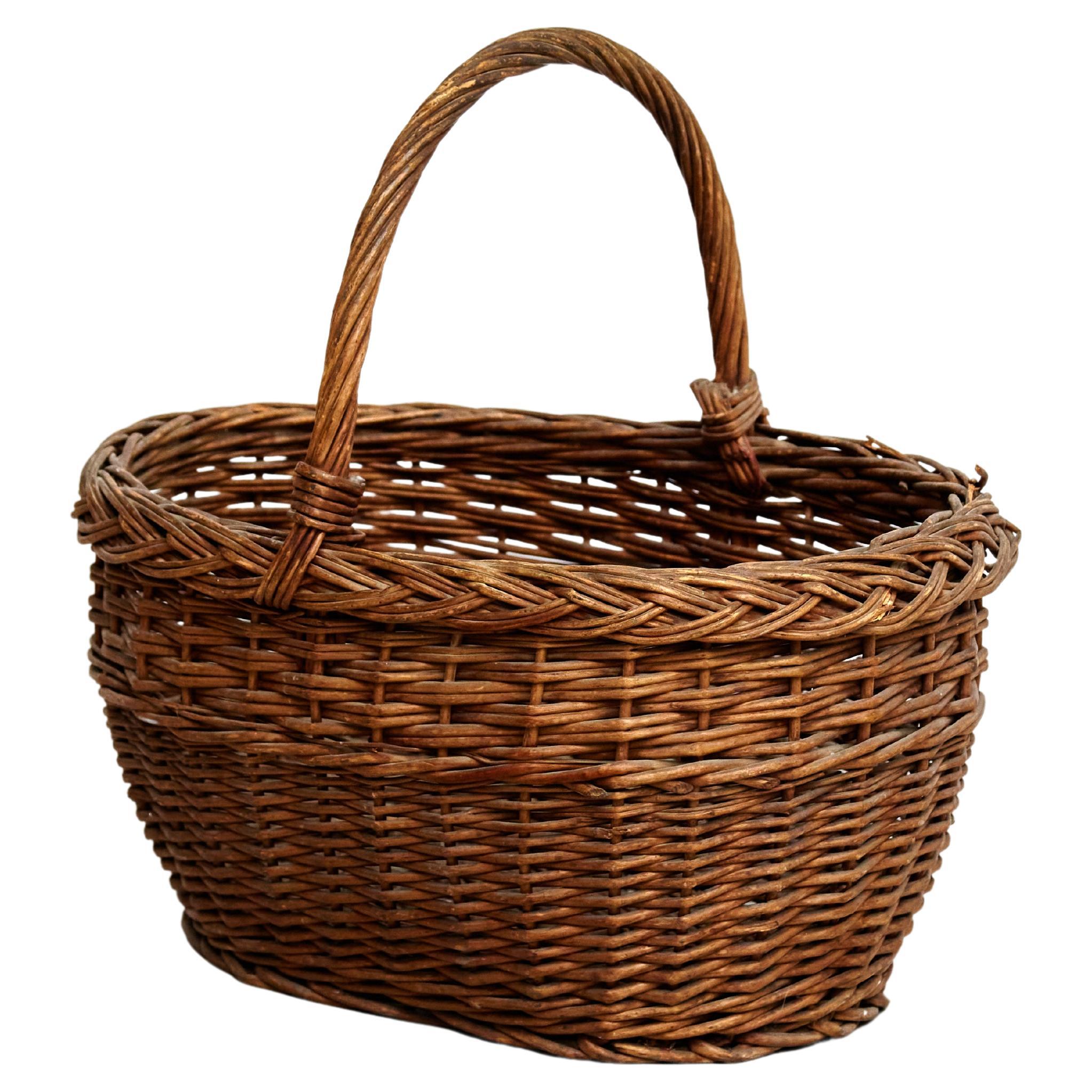 Panier rustique en rotin de style mi-siècle moderne, vers 1960