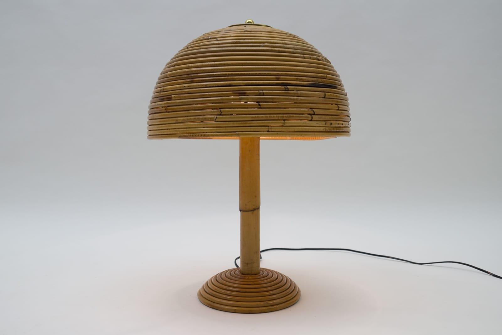 Executed in rattan and fabric, the lamp comes with 1 x E27 / E26 Edison screw fit bulb holder, is wired, in working condition and runs both on 110 / 230 volt.