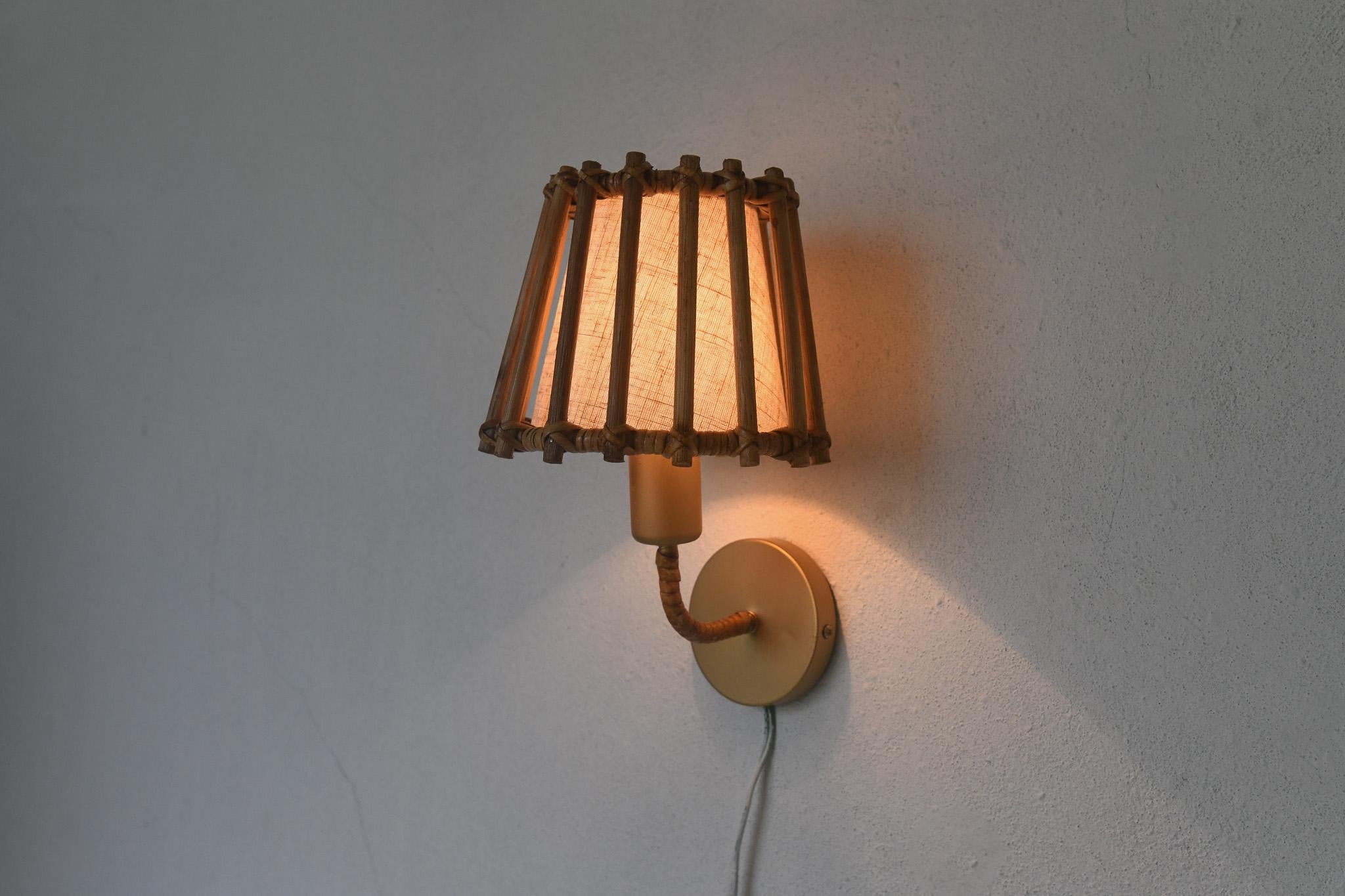 Contemporary Mid century modern rattan wall lamp For Sale
