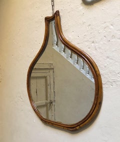 Mid-century modern rattan wall mirror