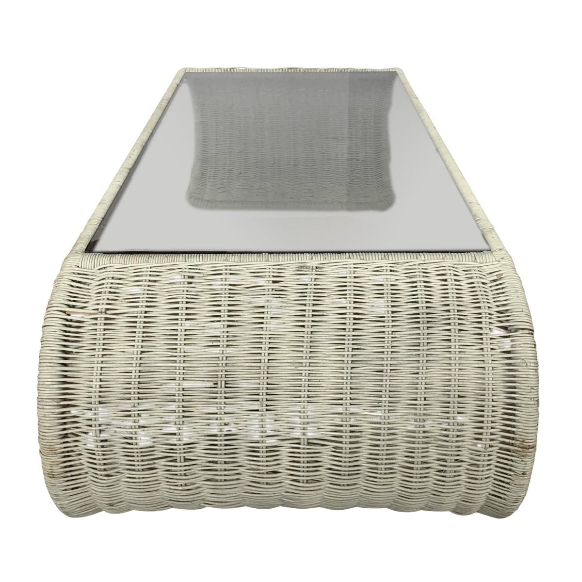 Mid-Century Modern waterfall form rattan wicker cocktail table.  A sturdy curved metal frame features original painted white wrapped wicker with a removable smoked glass top.  Beautiful indoors or outdoors under a protected area.  