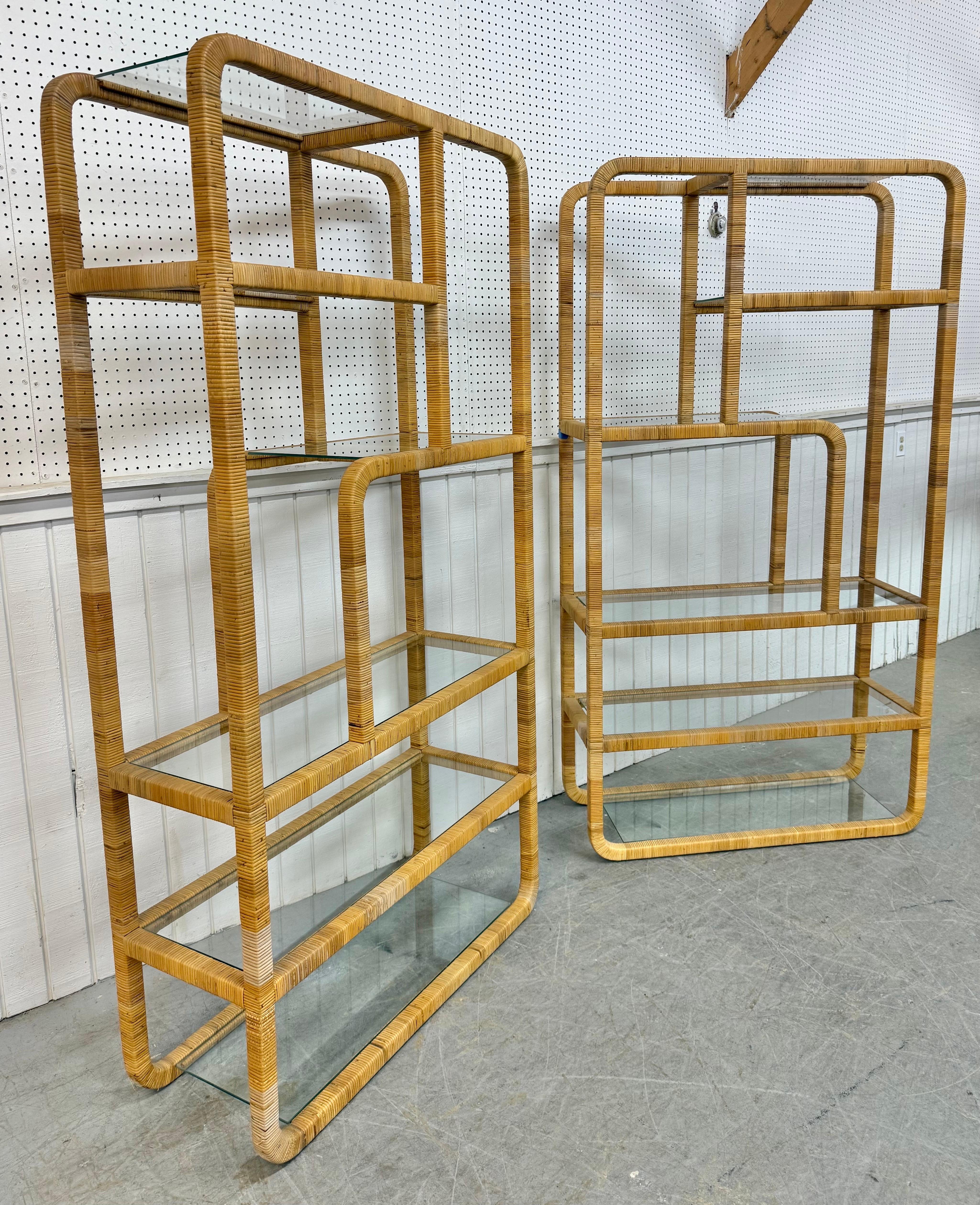 This listing is for a pair of Mid-Century Modern Rattan Woven Etageres. Featuring an identical pair of etageres, rattan woven frames, and multiple glass shelves for storage or display. This is an exceptional combination of quality and MCM design! 