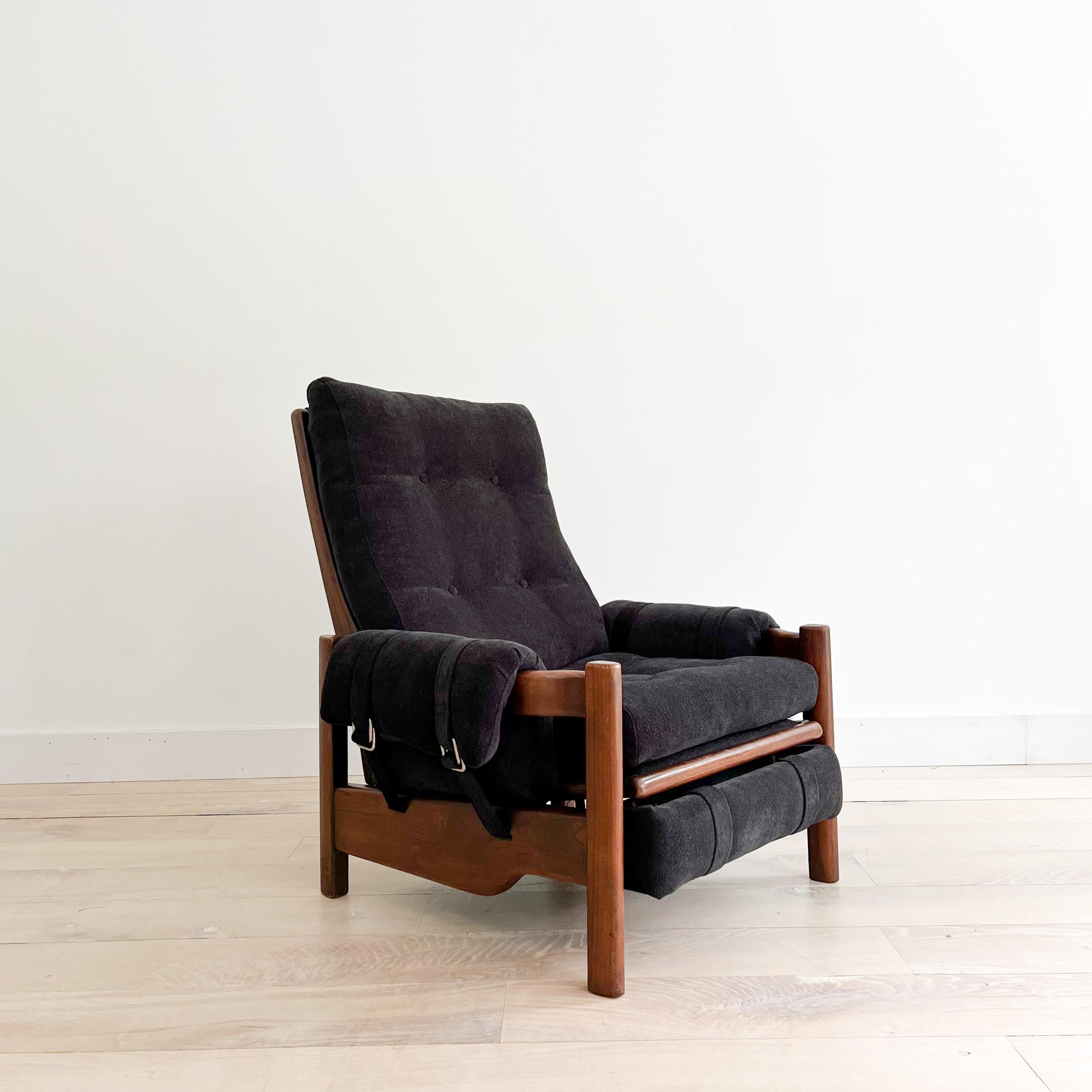 Mid-Century Modern recliner with all new black chenille upholstery. Some light scuffing/scratching to the wooden frame. Reclines back nicely and can go all the way back if you want to take a nap!