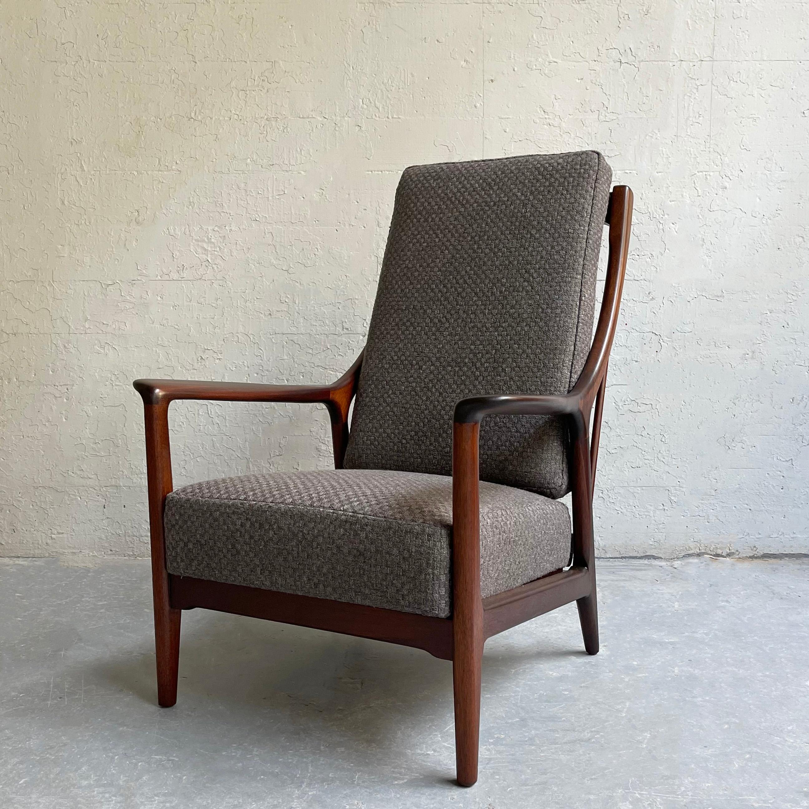 Stunning, Mid-Century Modern, reclining lounge chair features a elegant, walnut frame that slides from upright to a 3.5