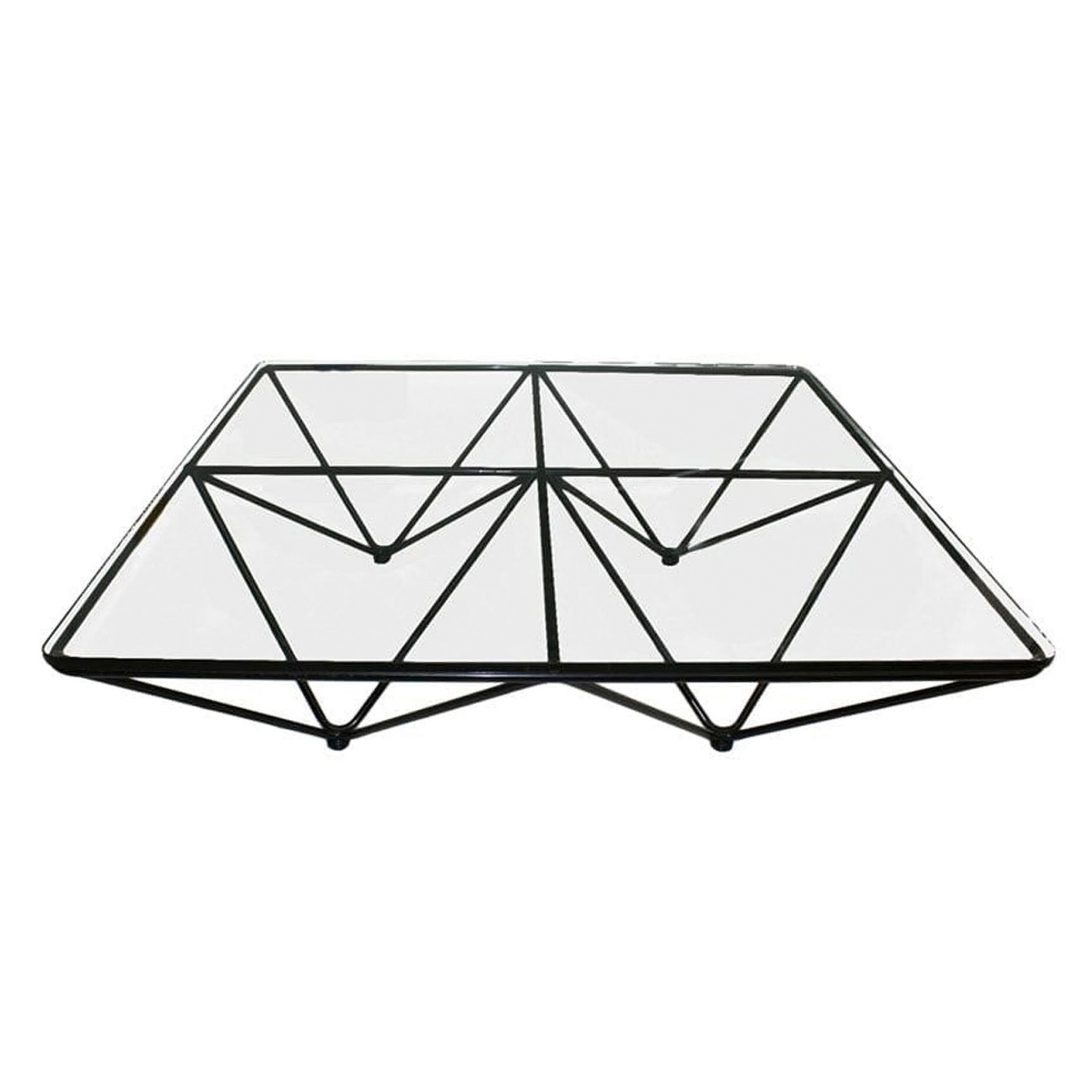 Table basse rectangulaire du célèbre designer italien Paolo Piva des années 1970 éditée par B&B Italia, modèle Alanda. Il est composé d'un plateau en verre et d'une base en métal tubulaire géométrique laqué noir. 

Paolo Piva (Adria, Italie, 1950-