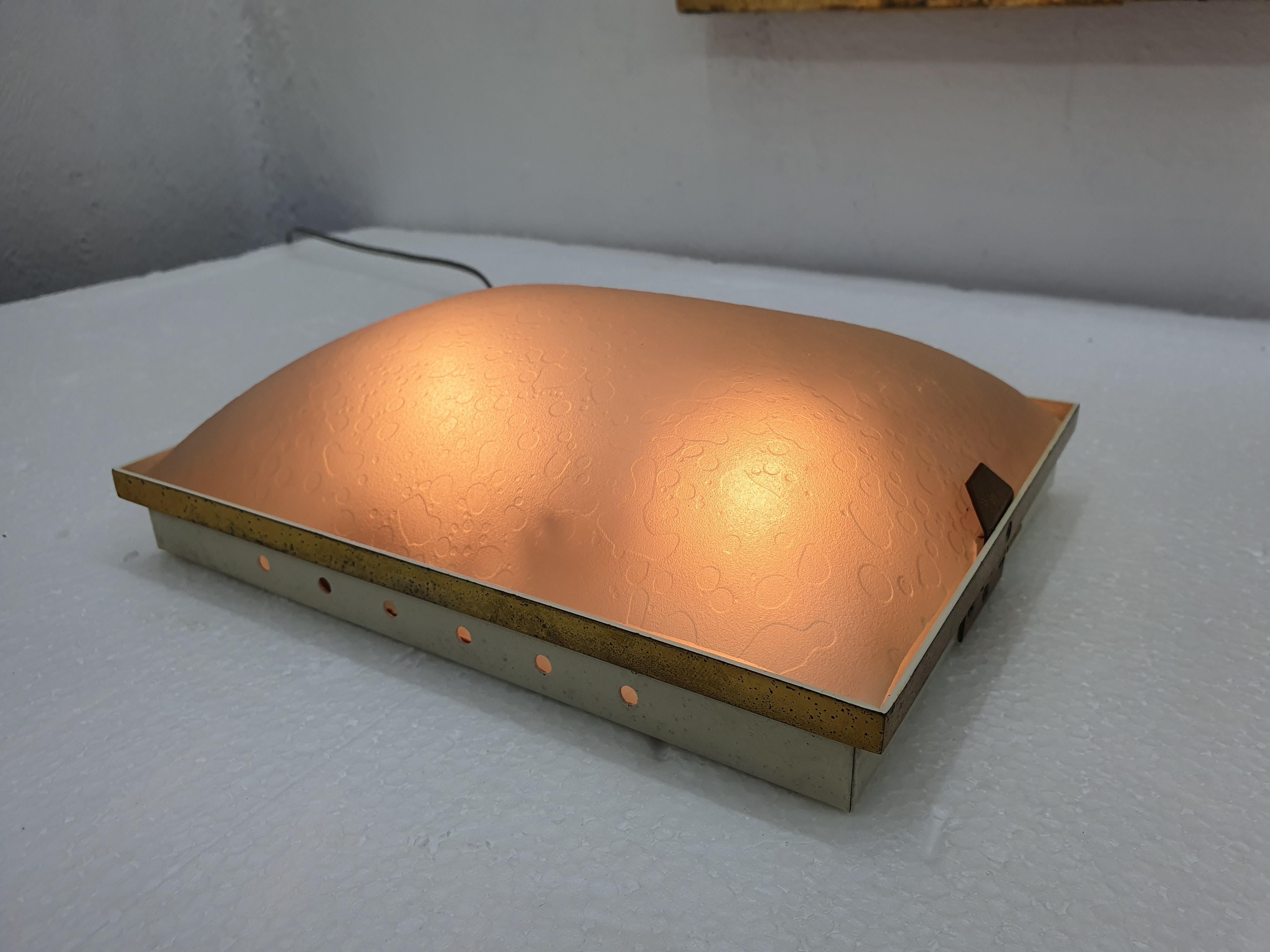 Two light, wall or flush mount lamp in brass, white lacquered metal body and frosted glass in the stamped in the back 