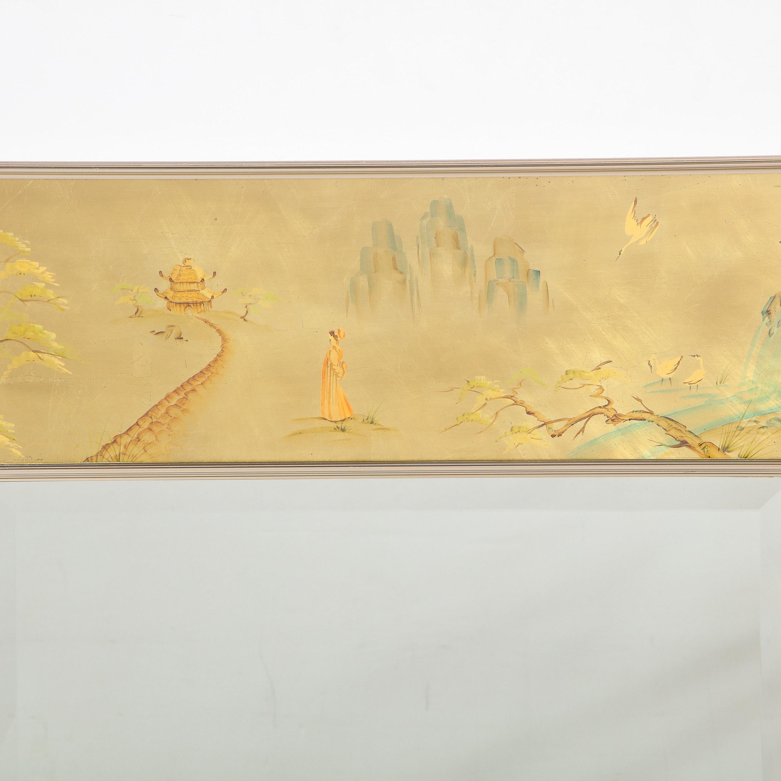 This exquisite chinoiserie reverse hand painted glass, gilt and églomisé mirror was realized by the esteemed American producer, La Barge, circa 1980. The piece features two chromed and reeded rectangular frames with a gilded hand painted chinoiserie