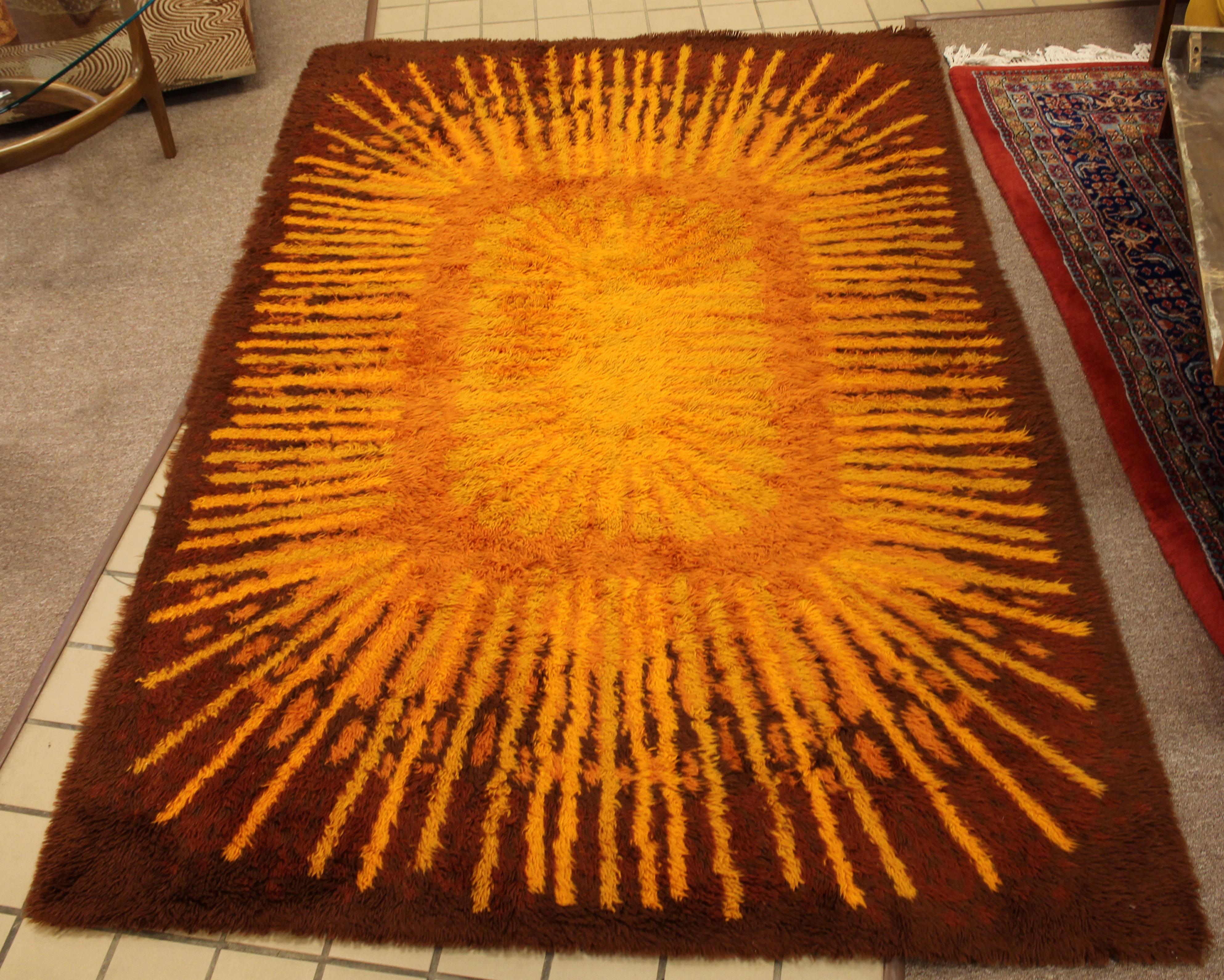 For your consideration is a wonderful, brown and yellow, rectangular Rya rug, circa 1960s-1970s. In excellent condition. The dimensions are 102