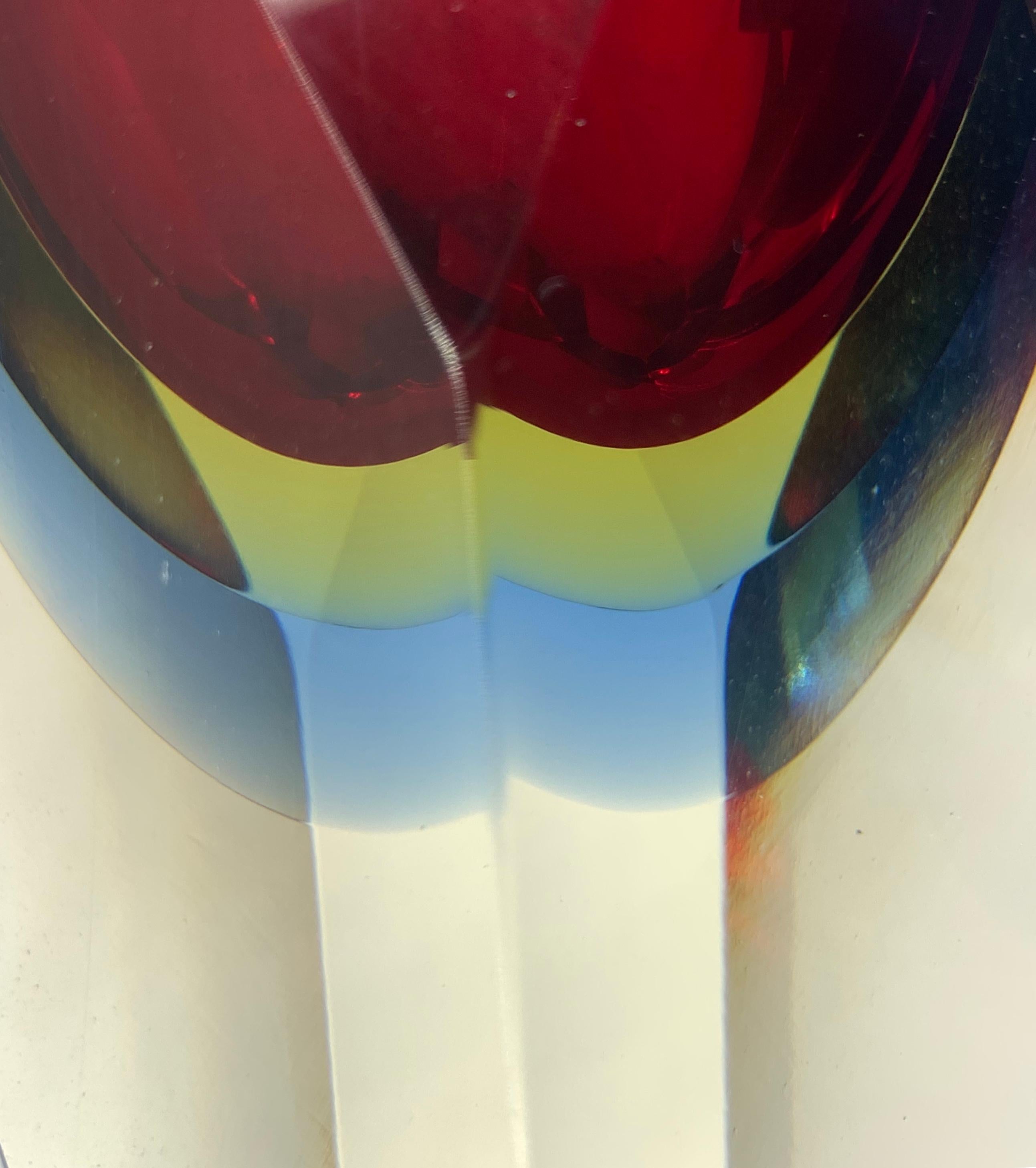 Mid-Century Modern red, blue and yellow faceted Sommerso Murano glass vase by Mandruzzato.