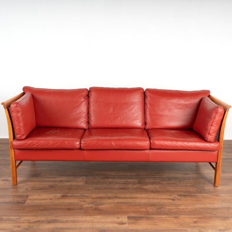 Mid Century Modern Red Leather Three Seat Sofa With Rattan Sides from