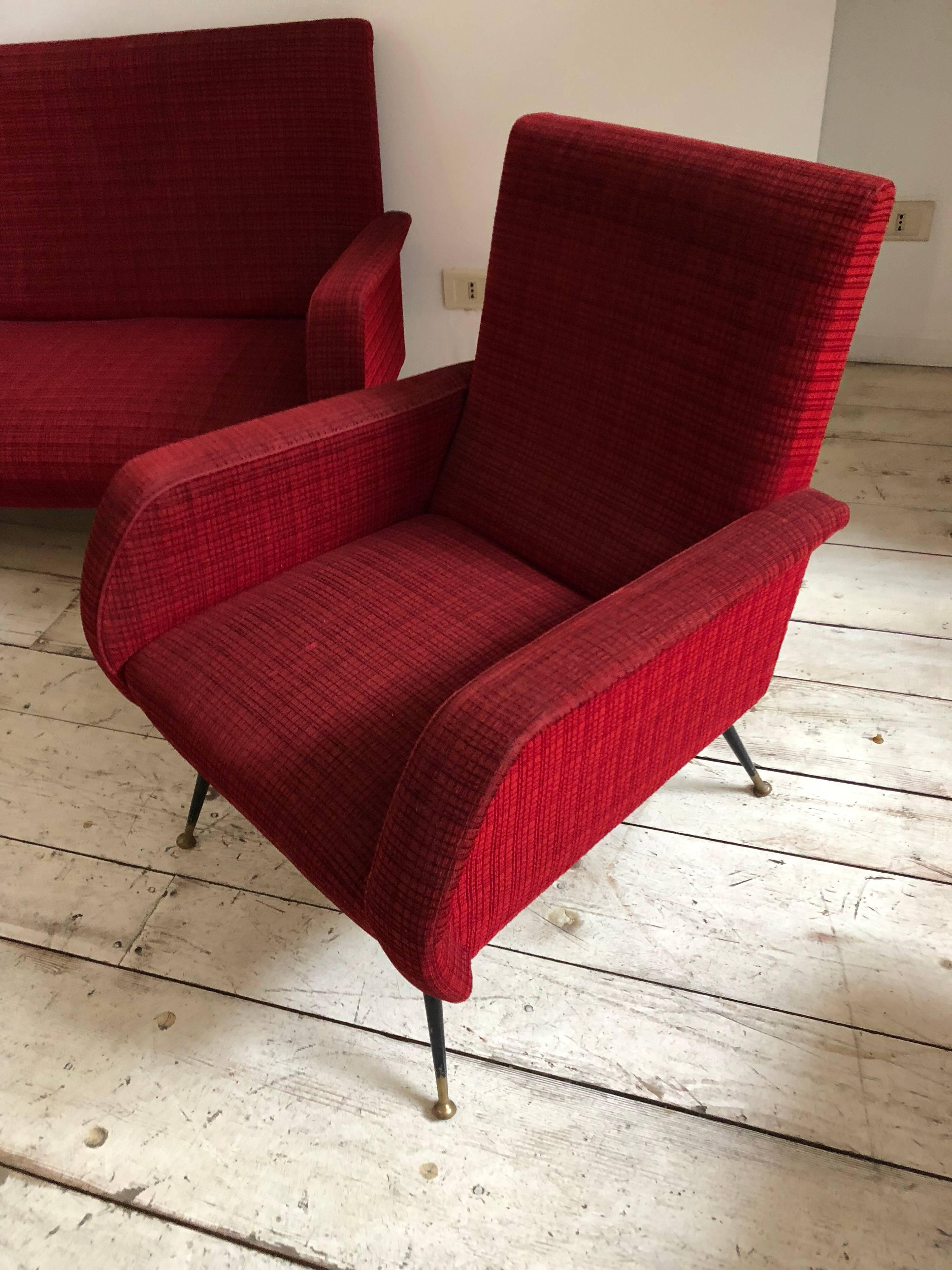 Stylish Mid-Century Modern sofa and two armchairs in the style of Gio' Ponti. They are in original red textile, good conditions overall, armchairs sizes: armchairs size cm 39 H 81, W 65, D 68.