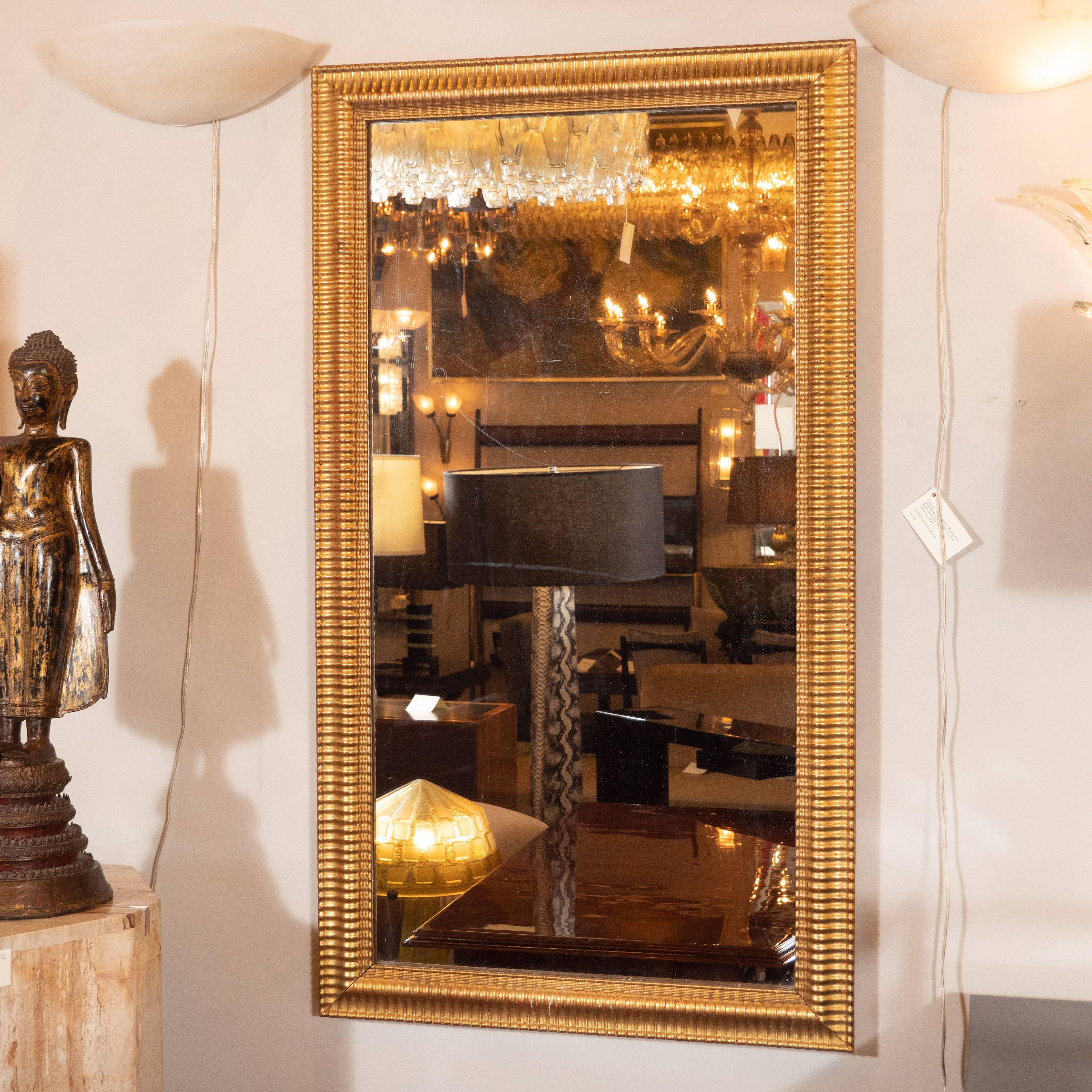 Mid-Century Modern Reeded Mirror Finished in 24-Karat Gilt In Excellent Condition In New York, NY