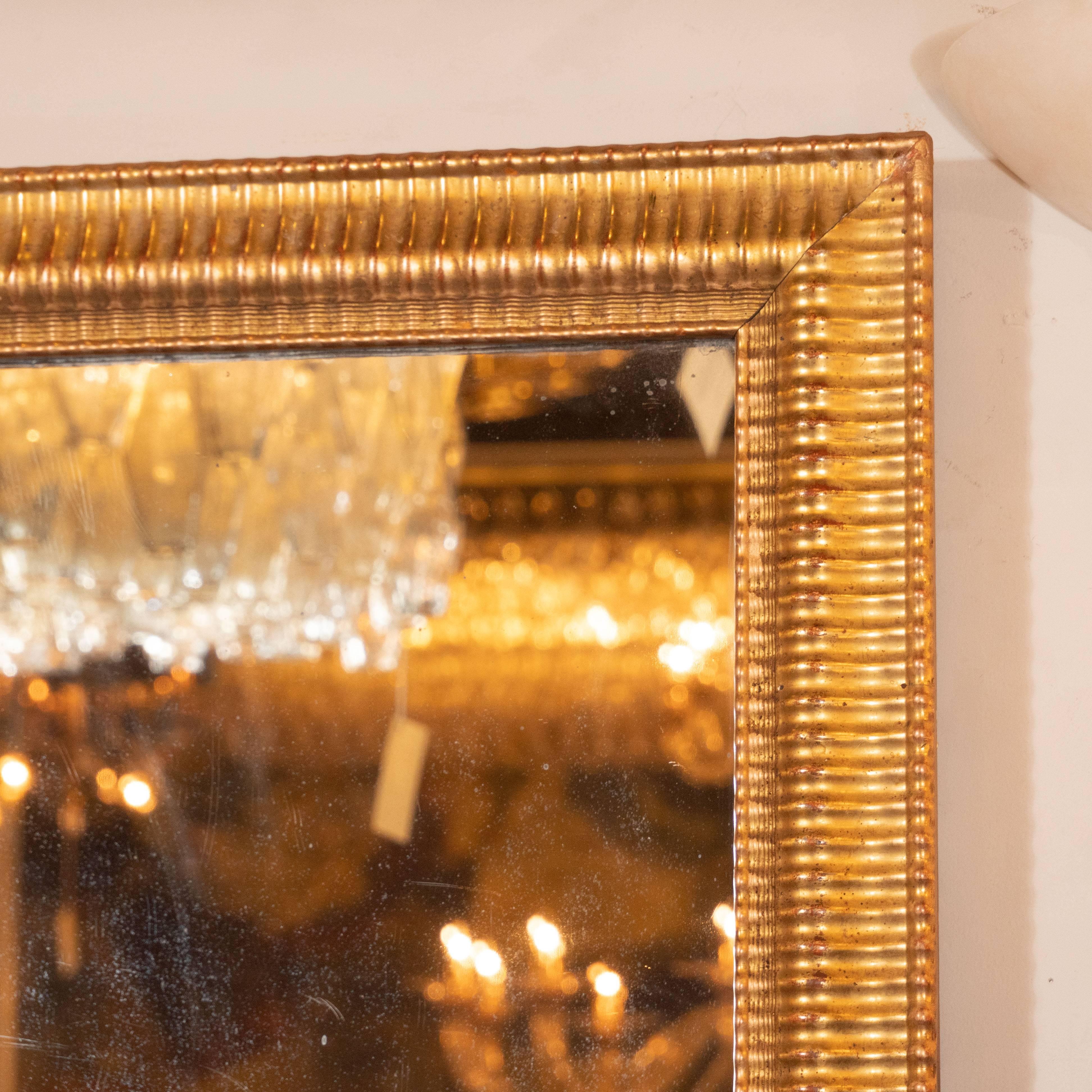 Mid-20th Century Mid-Century Modern Reeded Mirror Finished in 24-Karat Gilt