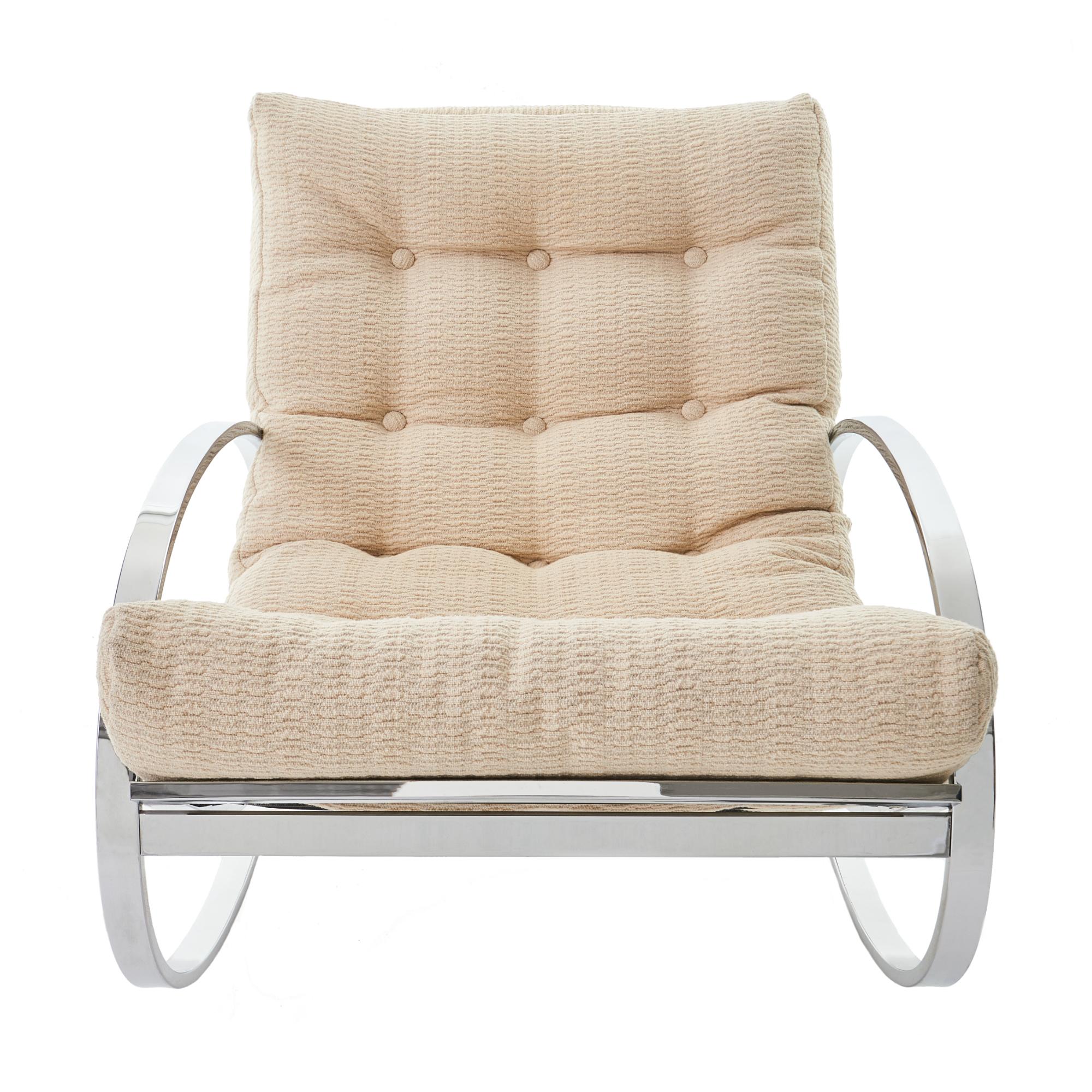Gorgeous Mid-Century Modern chrome 'Ellipse' rocking chair designed by Renato Zevi for Selig. Sleek and glamorous design, featuring a polished chrome oval frame and original cream colored upholstered seat. 

Measures: H 31 in. x W 27.5 in. x D 41