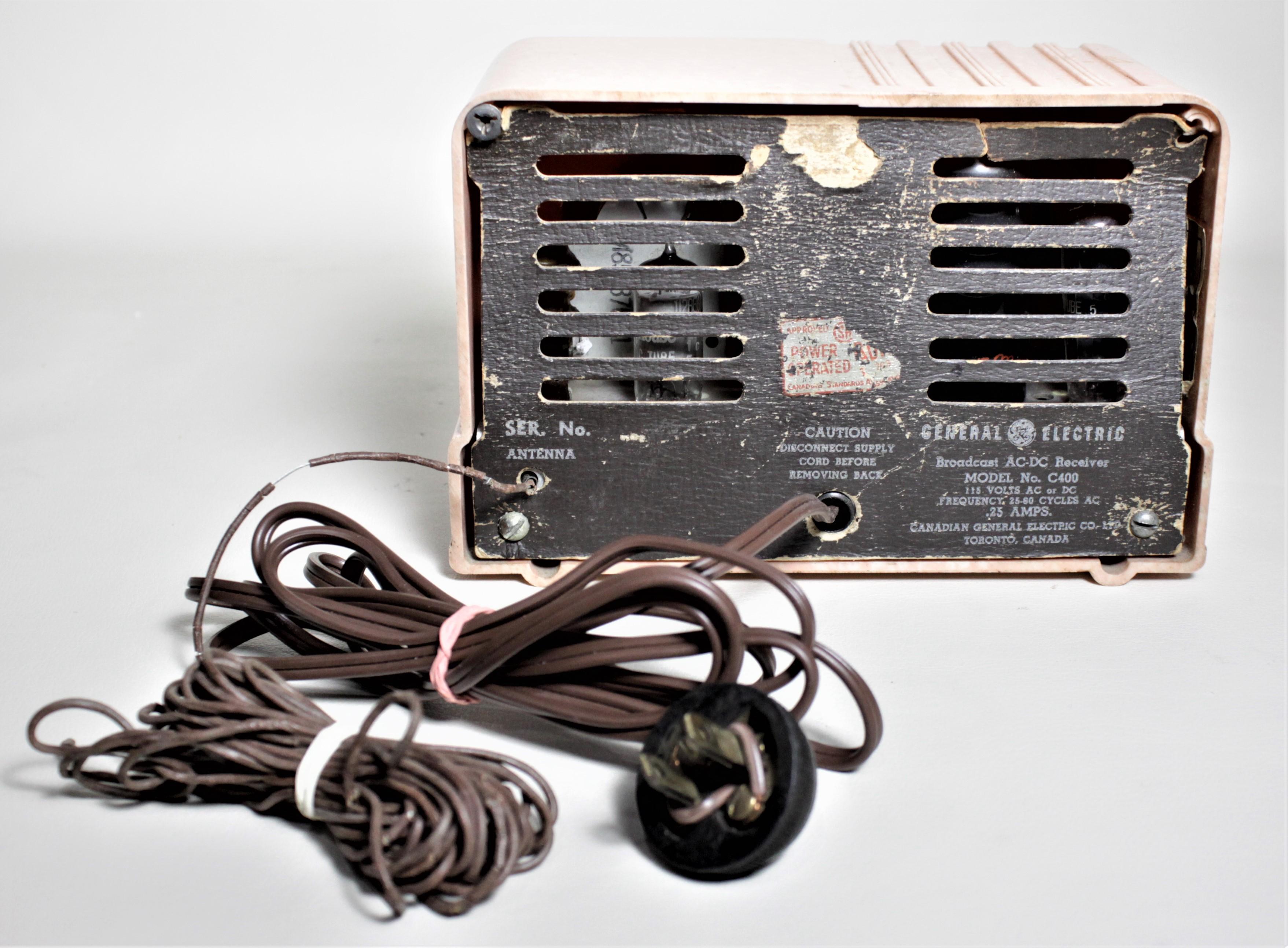 Machine-Made Mid-Century Modern Retro Pink General Electric Model C400 Tube Table Radio