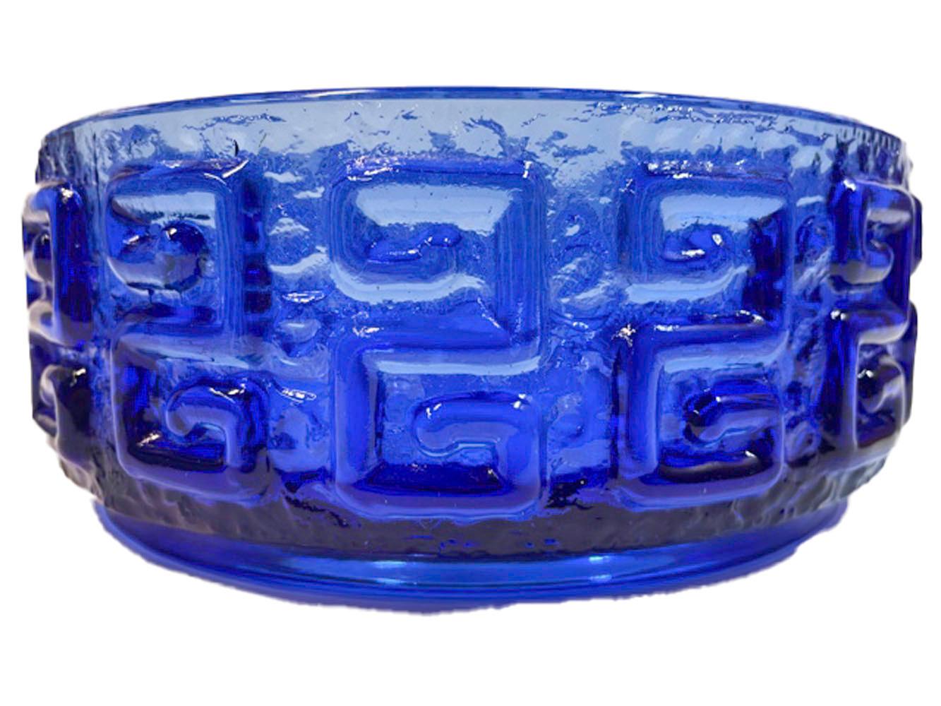 Vintage Scandinavian glass center bowl in kingfisher blue, the pebble textures exterior with raised Greek Key motif.