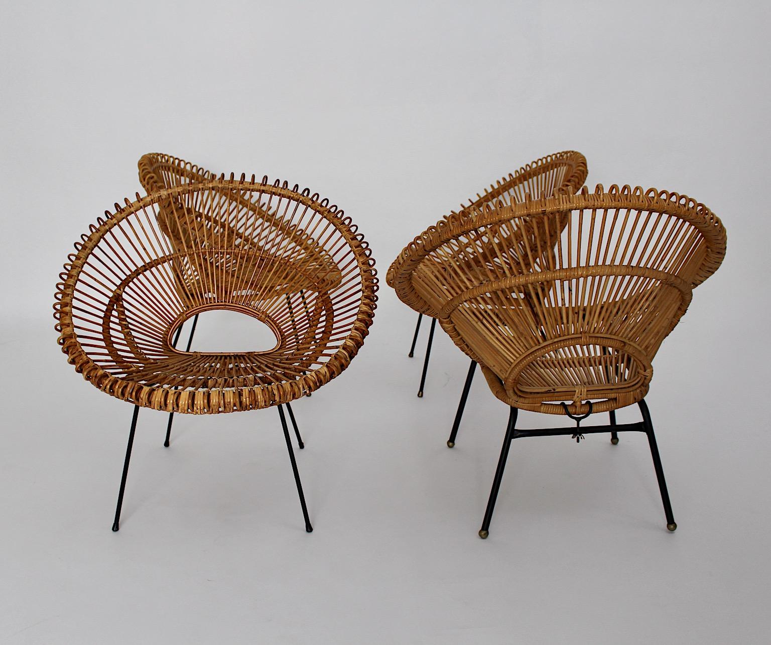 Metal Mid-Century Modern Riviera Style Four Rattan Patio Lounge Chairs c 1960 France For Sale
