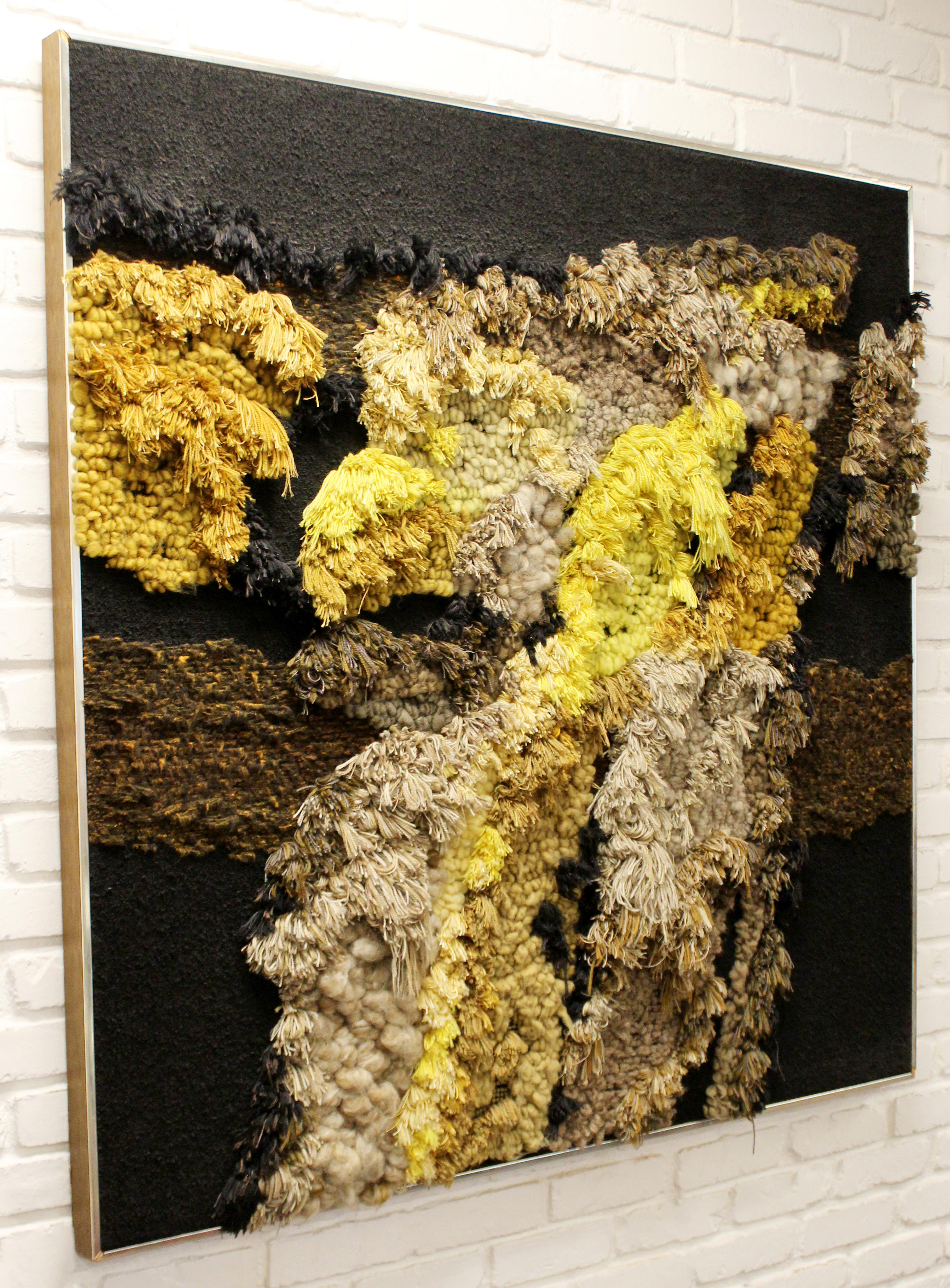 For your consideration is a magnificent, framed, handwoven, abstract fiber wall art, by Robert Kidd, circa 1970s. In excellent condition. The dimensions are 54